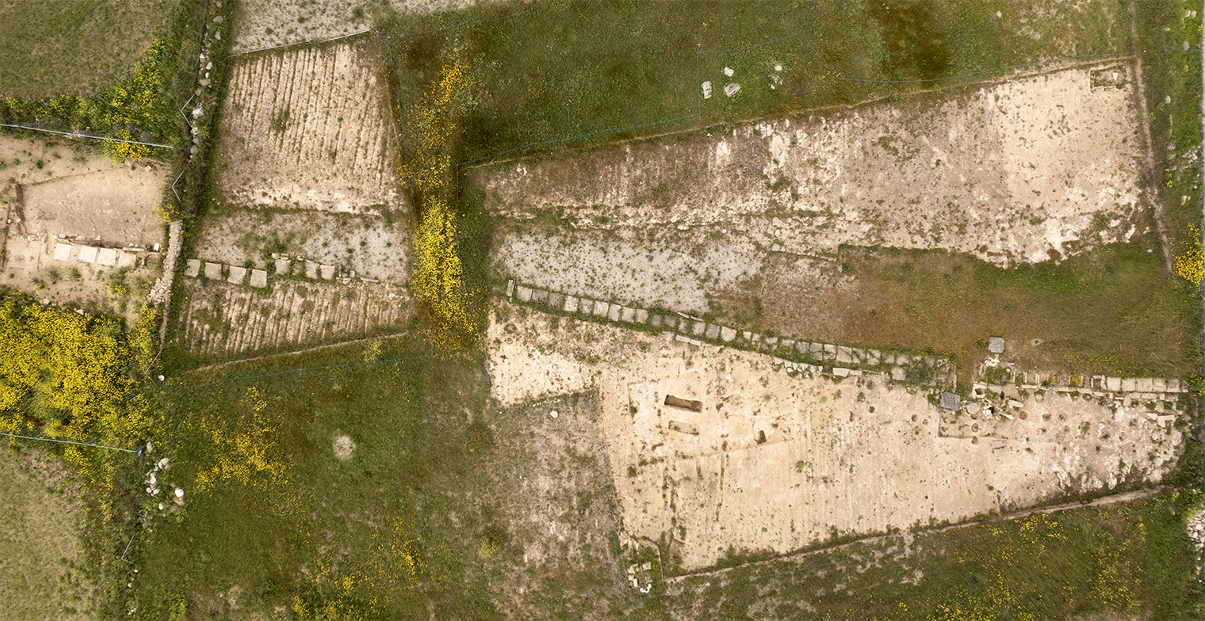 Aerial and ground view of the excavation site.