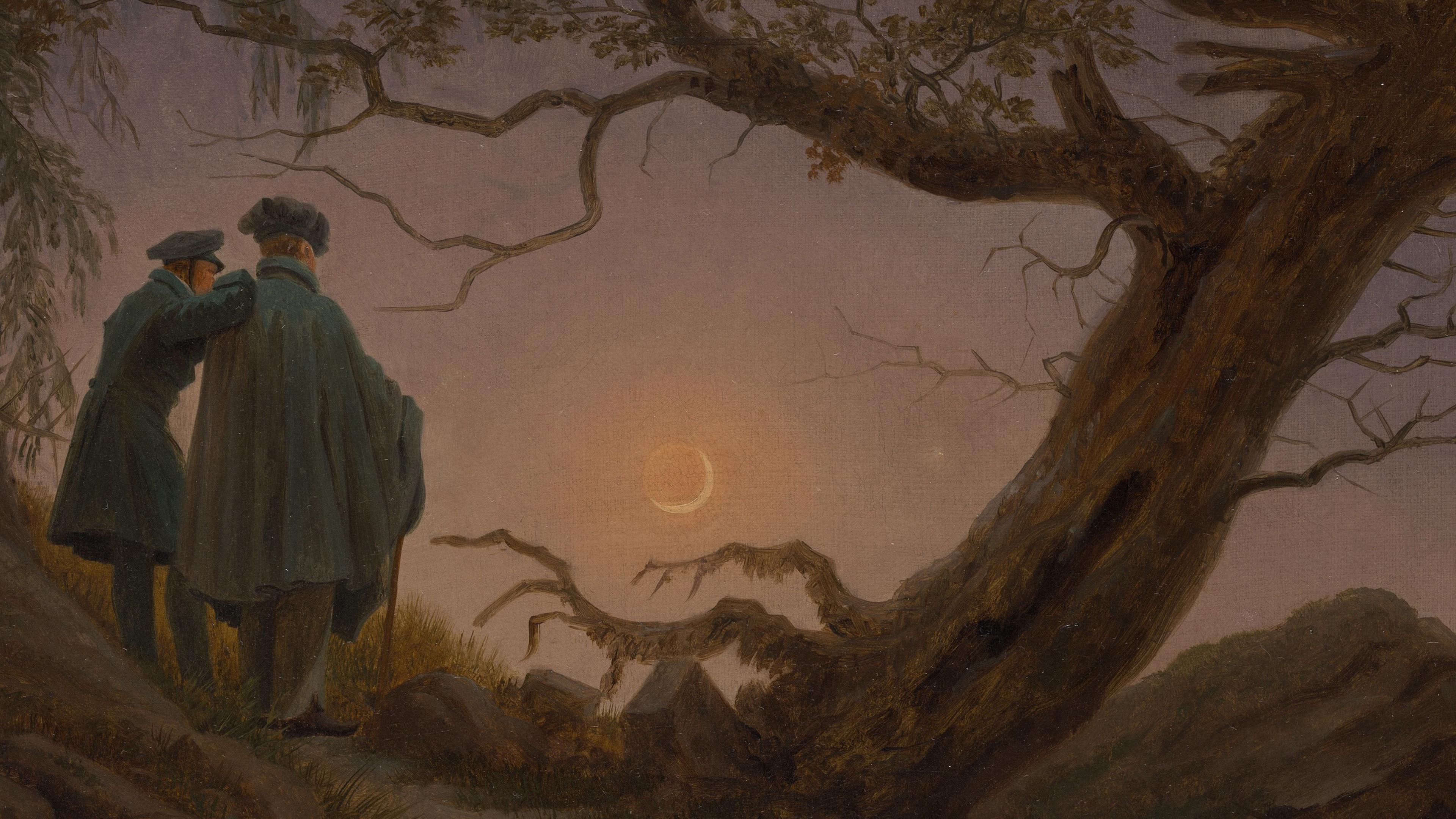 Two men in coats stand beside a large tree, gazing at a crescent moon in a dusky sky.