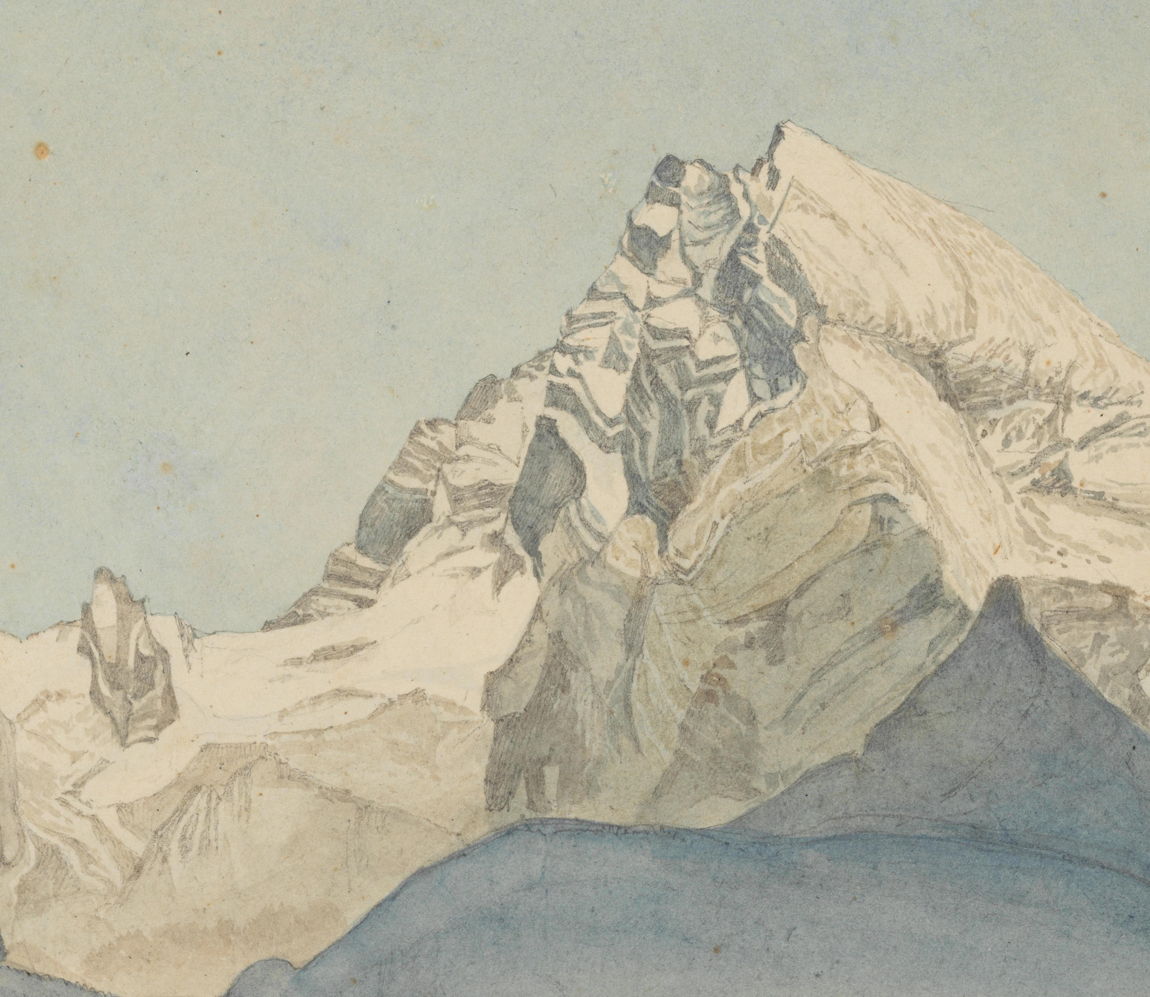 A detail of a snowy, jagged mountaintop against a light-blue sky