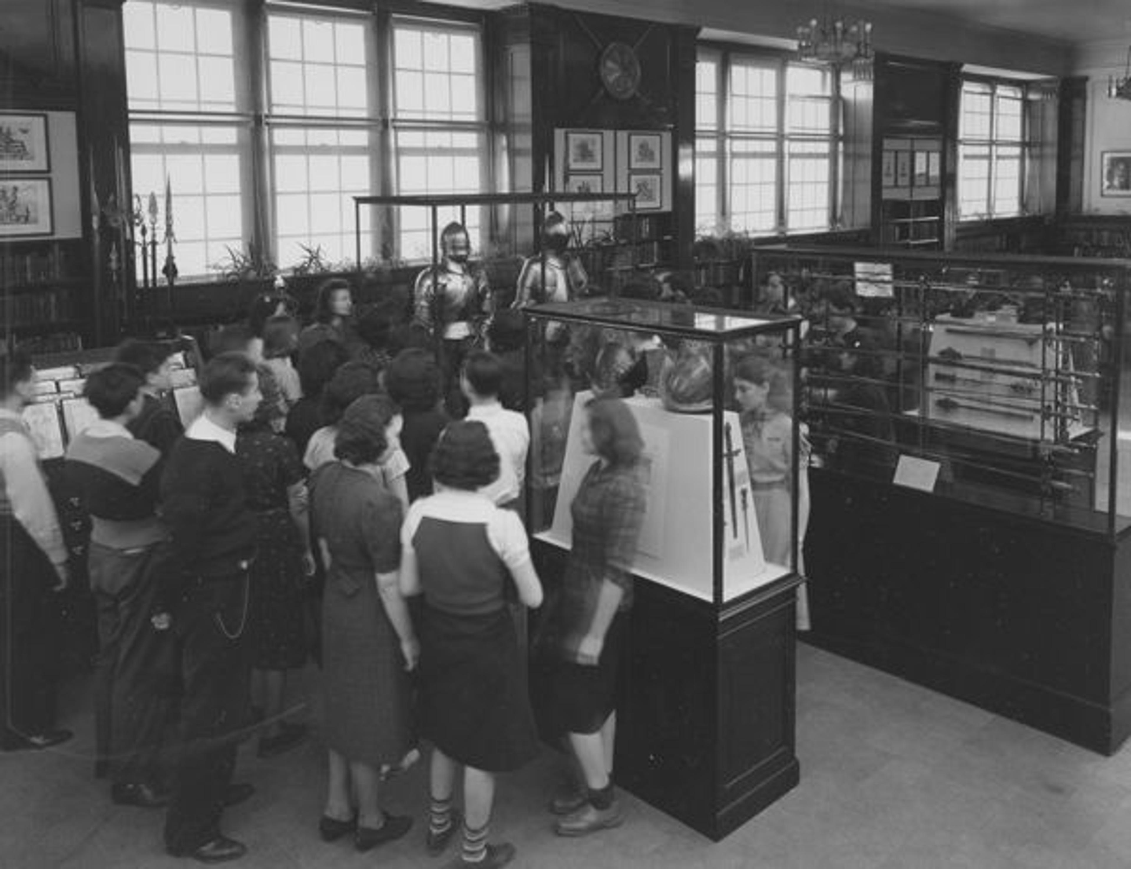 Theodore Roosevelt High School (The Bronx, New York): Arms and Armor (opened February 9, 1939); With teacher and students visiting the exhibition. Photographed February 1939