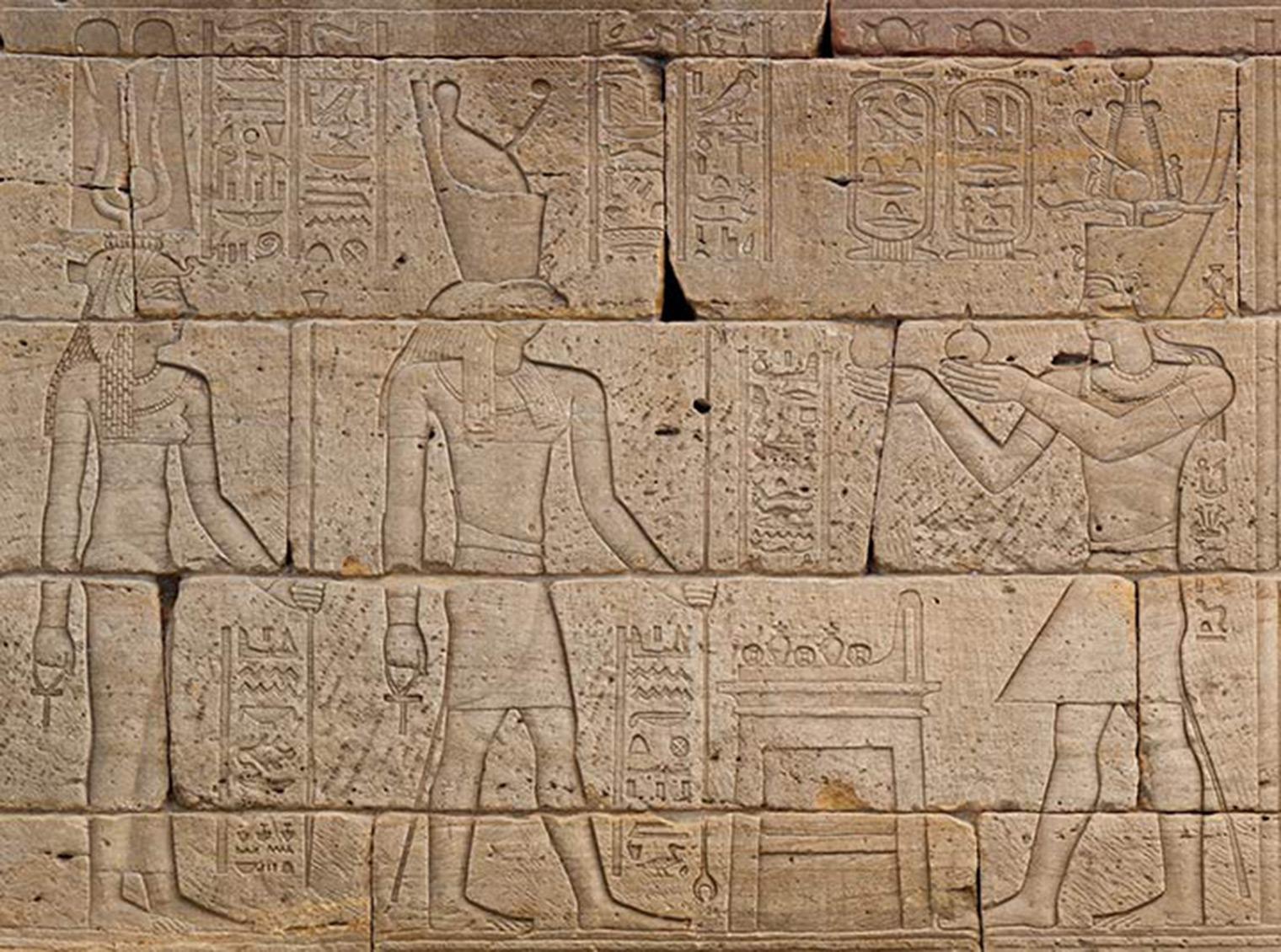 Detail depicting Augustus (right) offering wine to the deities Harendotes and Hathor (center and left).