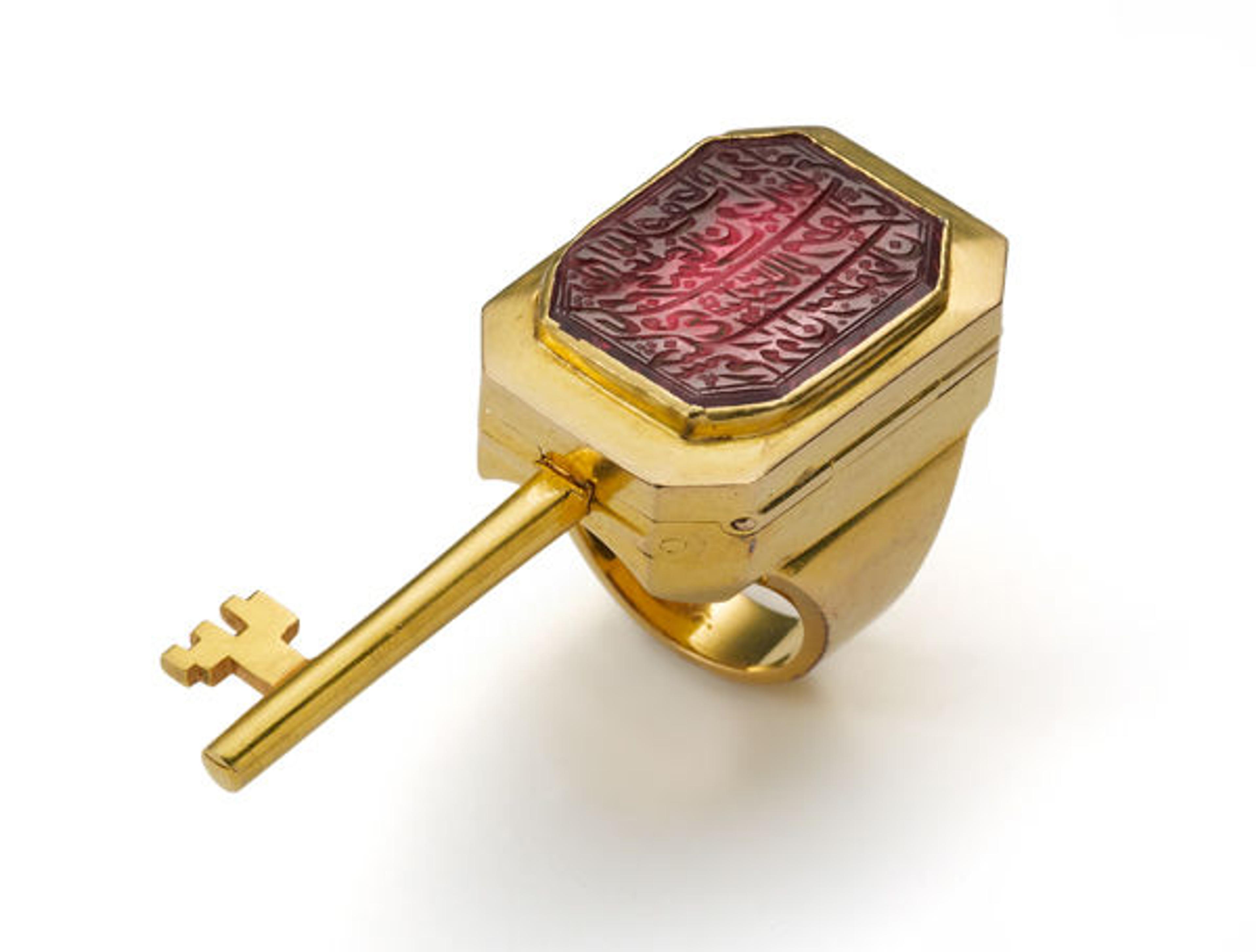 Seal Ring with Hidden Key, 1884–1885. South India, Hyderabad. Gold, set with spinel; H. 1 1/8 in. (2.7 cm), W. 1 1/8 in. (2.8 cm); W. (with key extended) 2 1/8 in. (5.3 cm). The Al-Thani Collection.