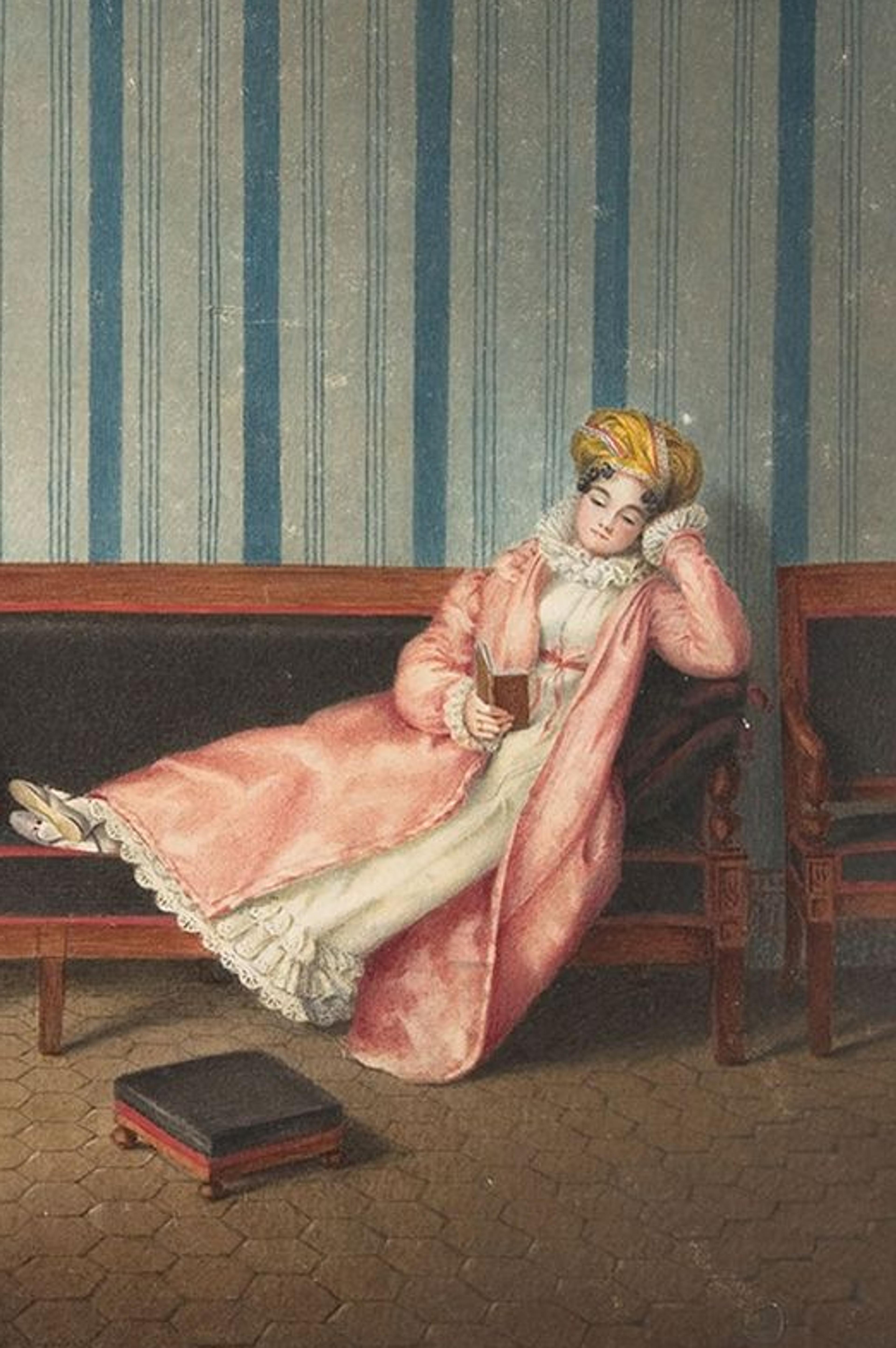 A print of a woman in a pink coat and white dress lounging and reading leisurely in a sitting room.
