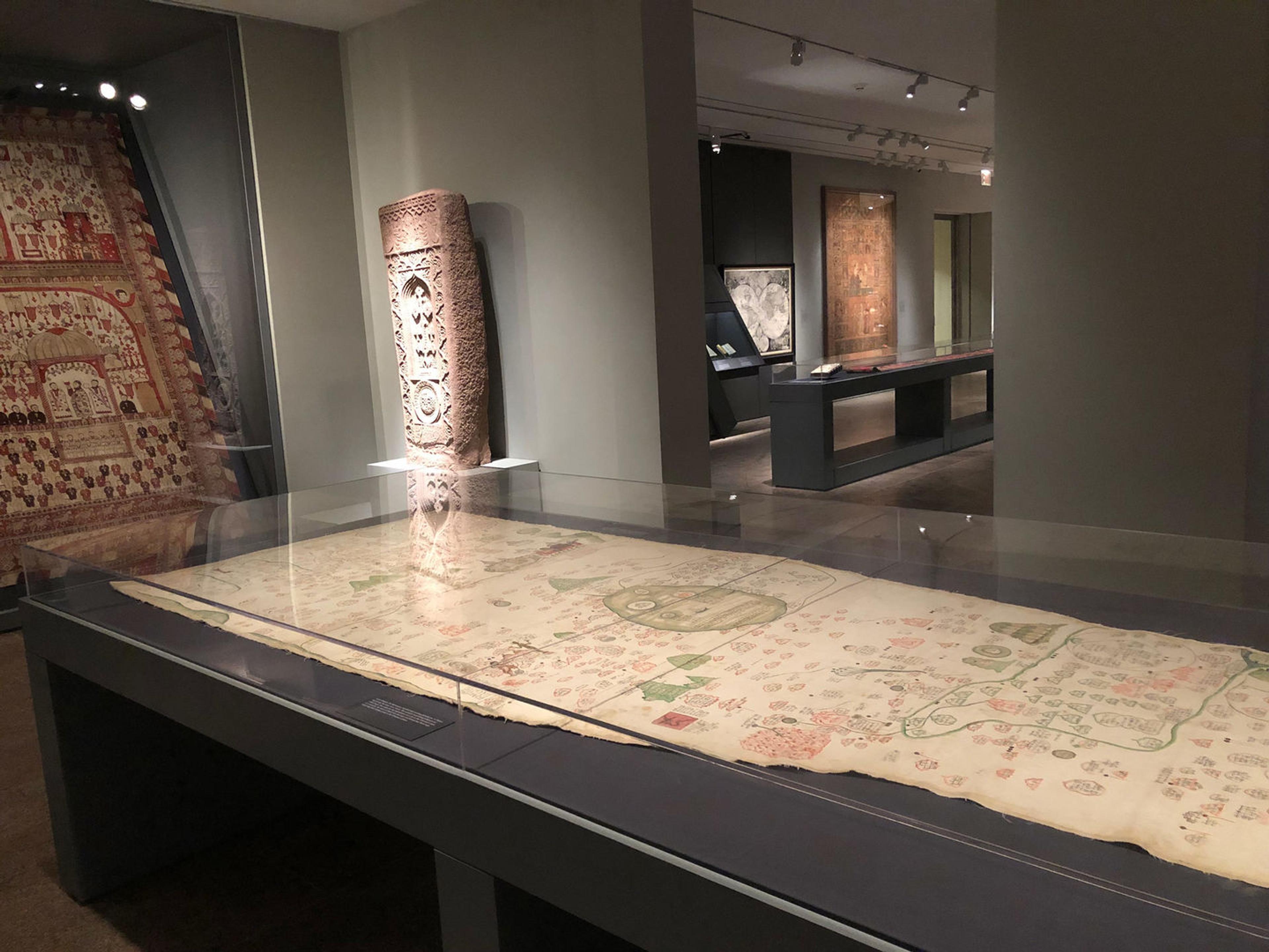 View of the map in the gallery, lying in a glass case