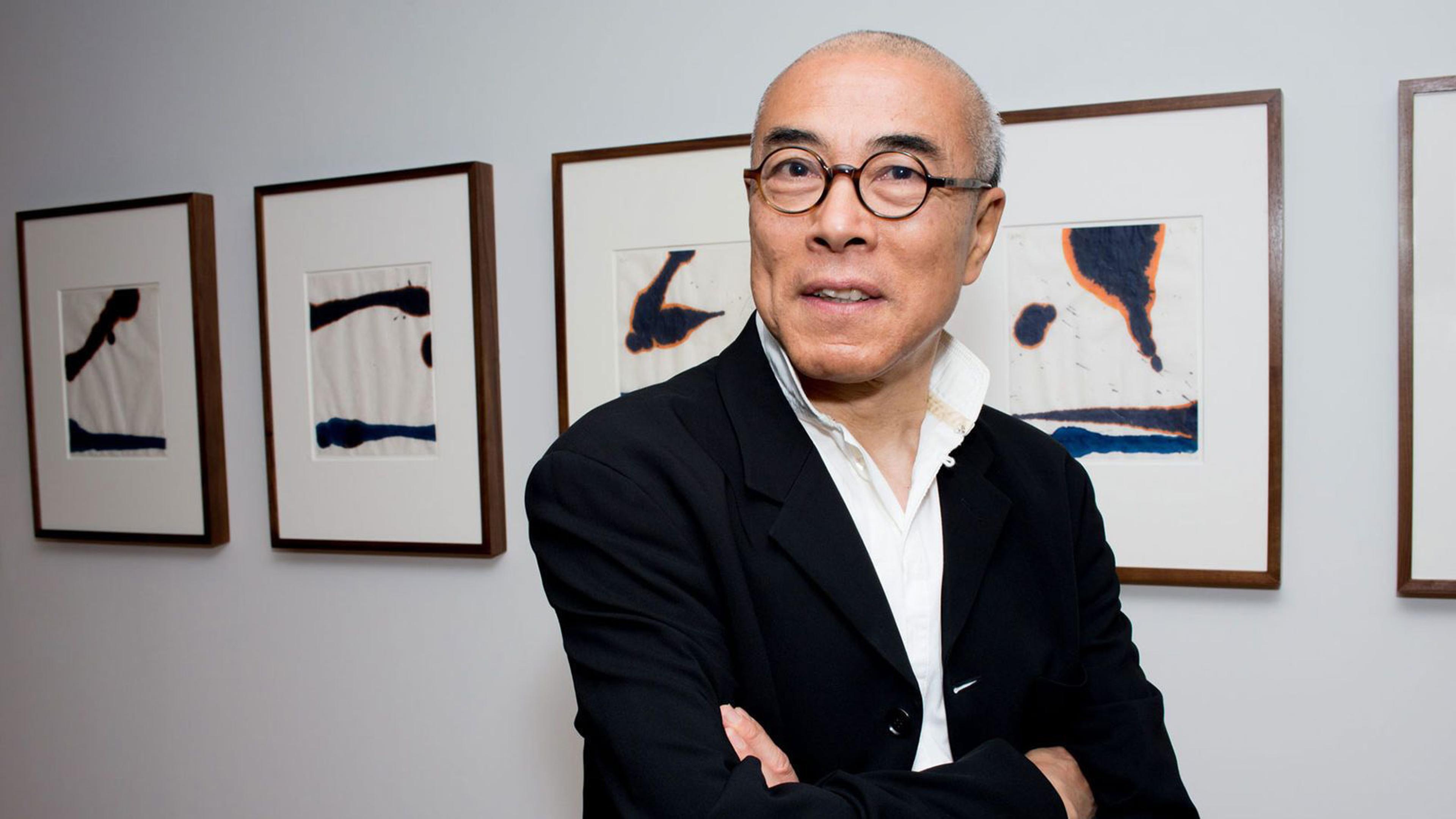 Artist Wenda Gu stands in front of Robert Motherwell's "Lyric Suite."