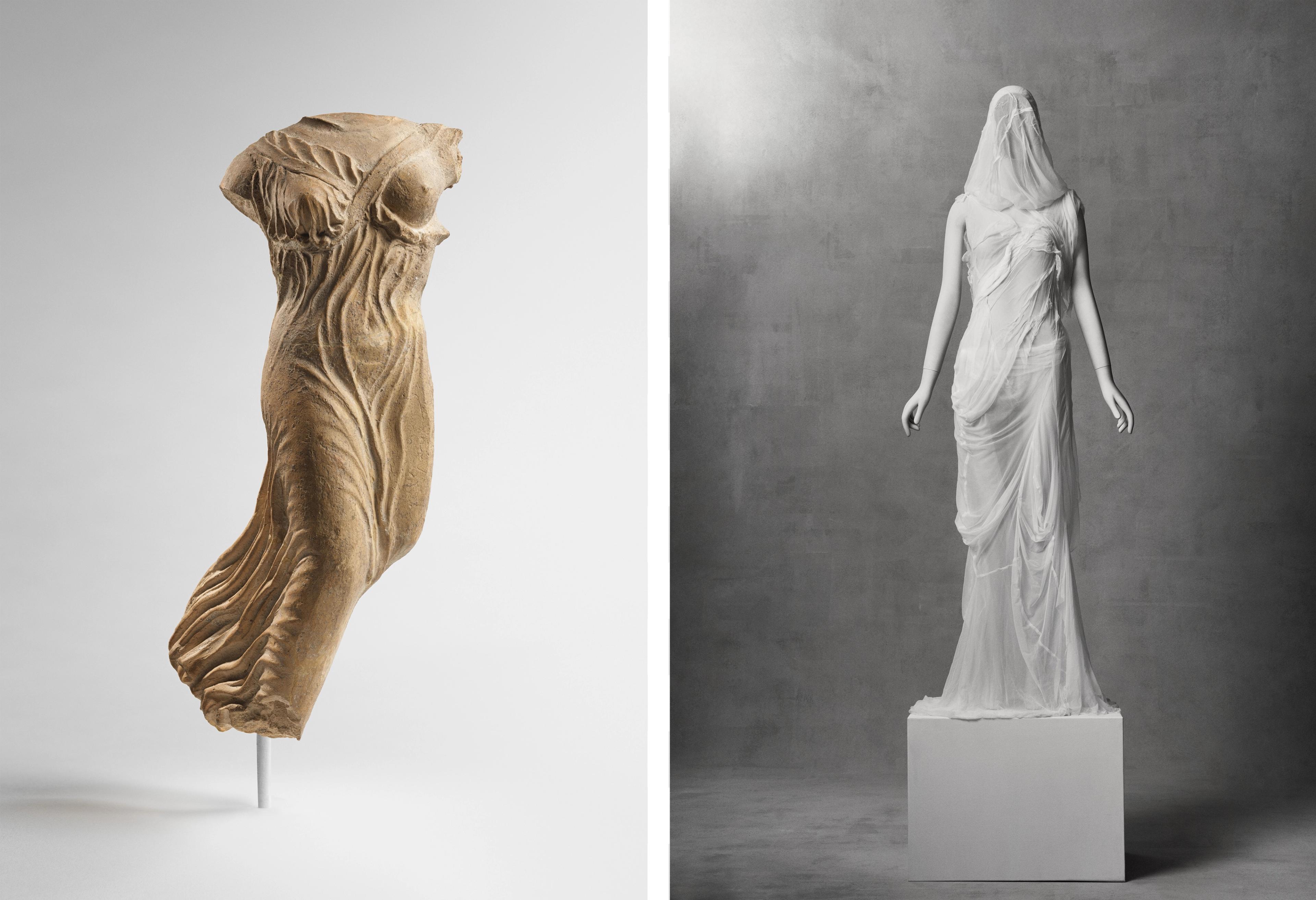 On the left, a textured beige stone sculpture captures flowing drapery on a torso. On the right, a veiled white marble statue stands.