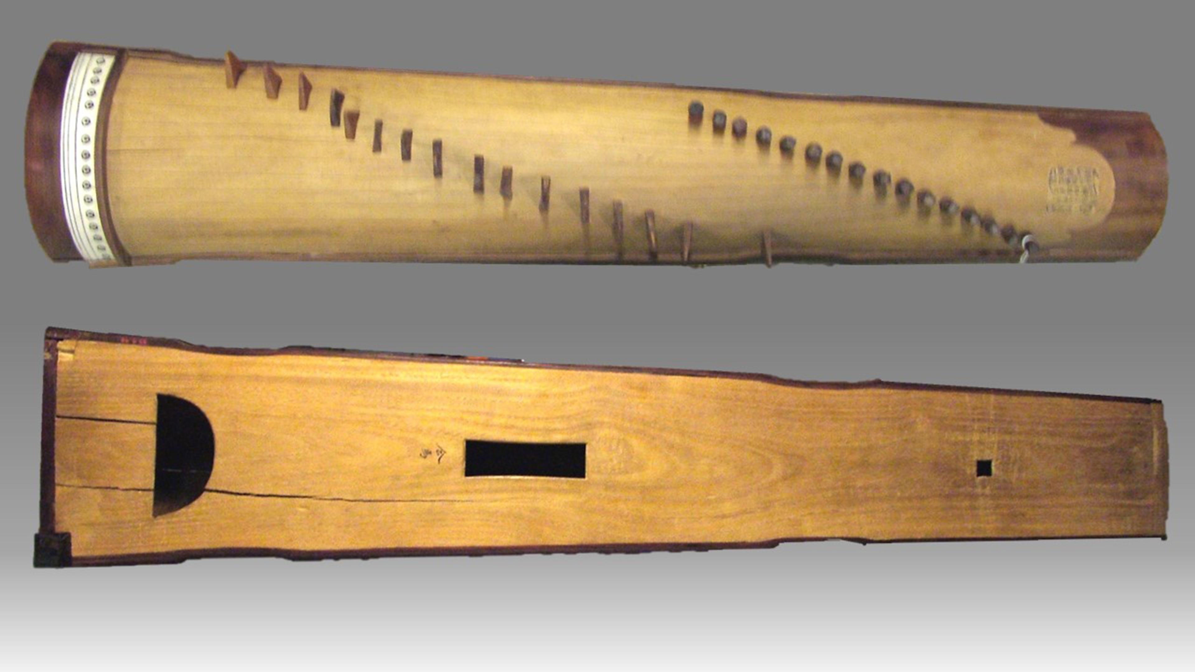 Pegged top and underside of a wooden zheng.