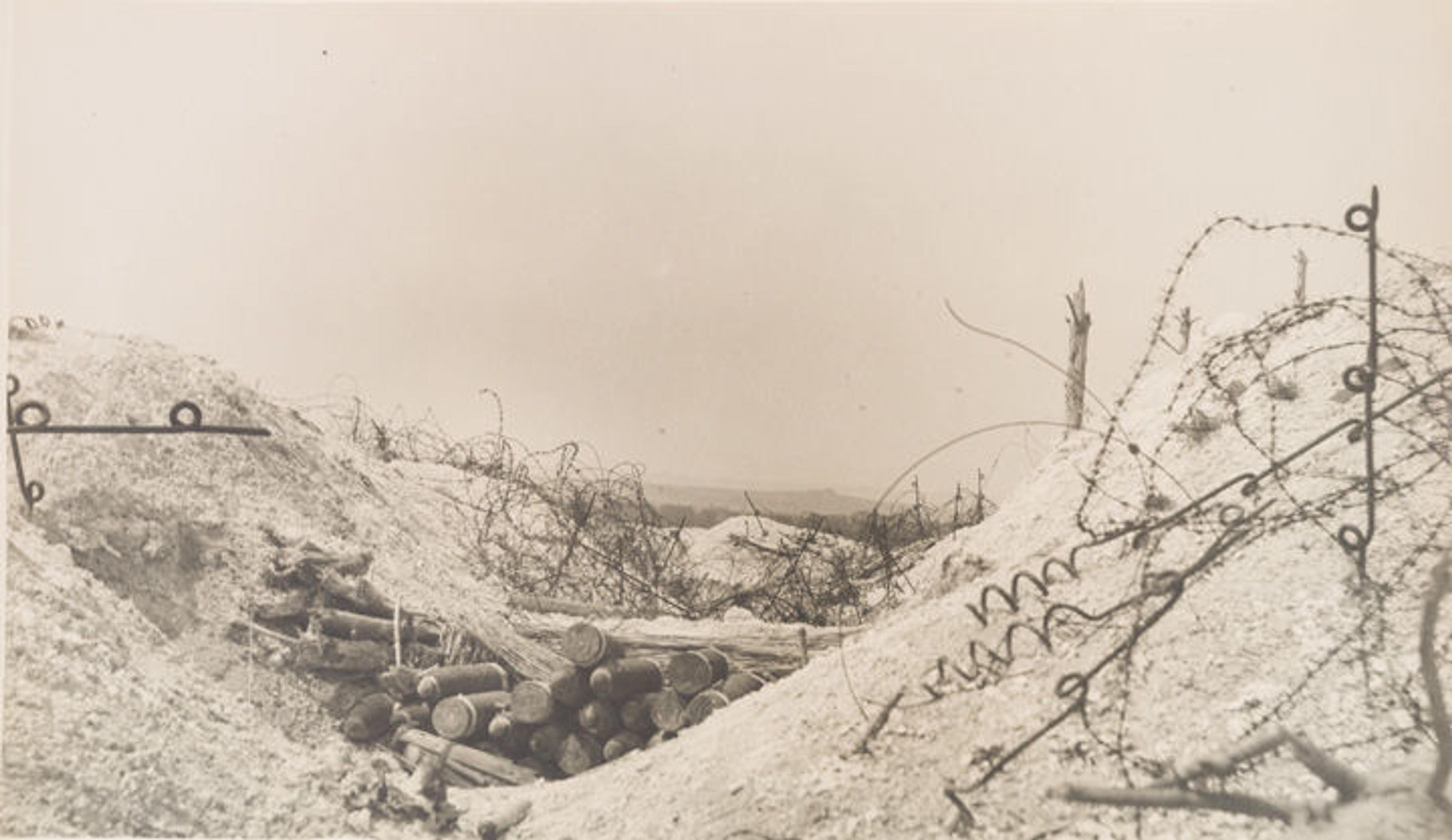Photo by Margaret Hall of a French battlefield marked with barbed wire and trenches