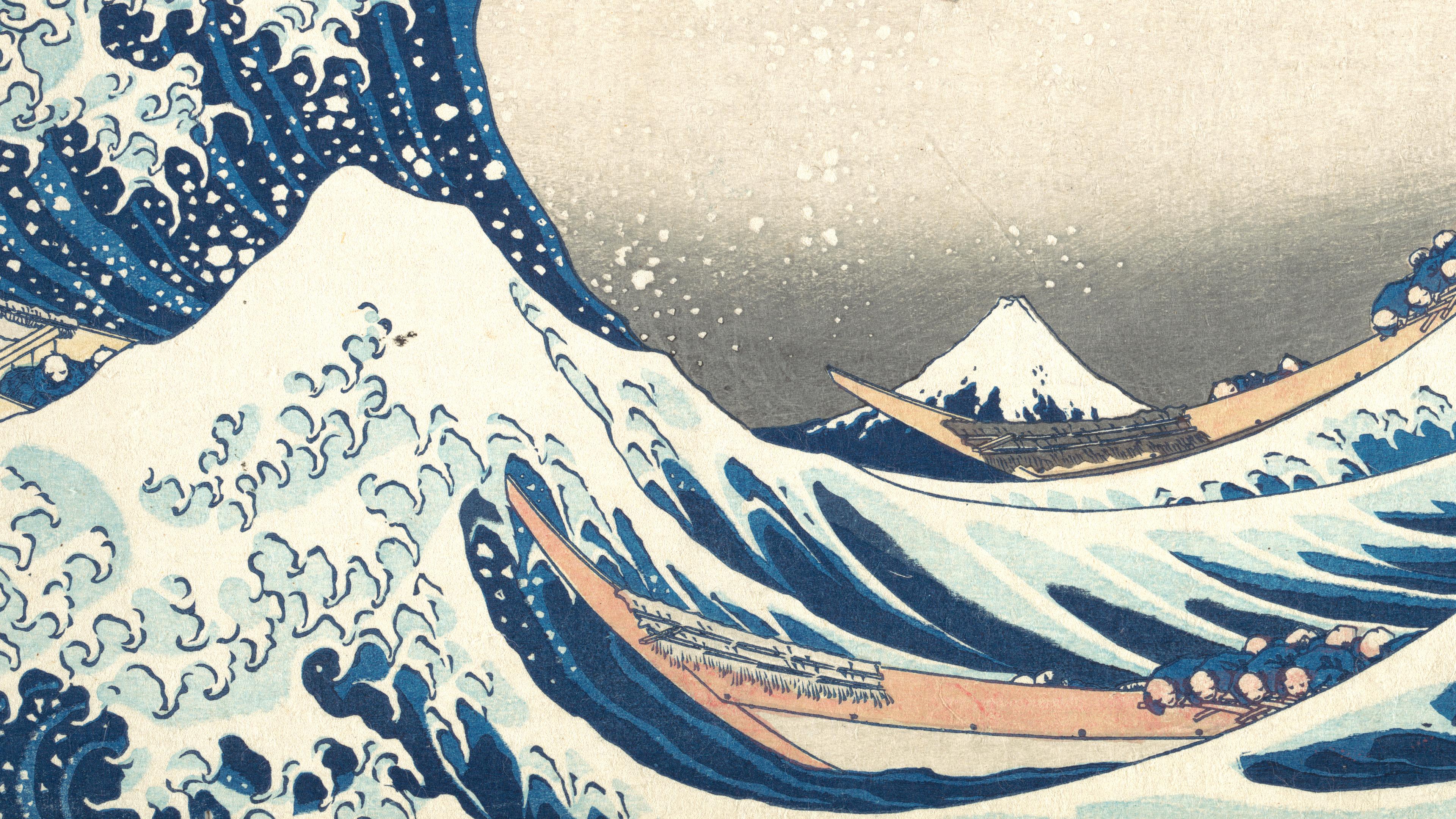 Detail of the Great Wave showing two boats on whitecapped blue waves with Mount Fuji in the distance
