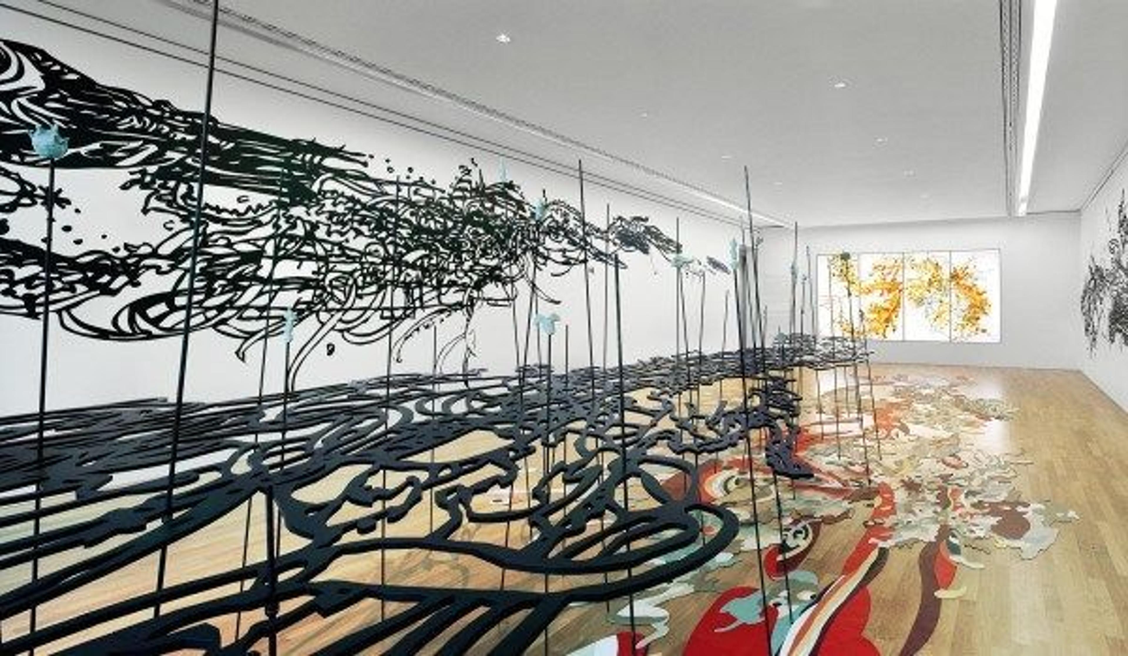 A room-sized installation by artist Matthew Ritchie consisting of an acrylic wall drawing, rubber and Tyvek carpet, photographic light box, and oil and marker painting