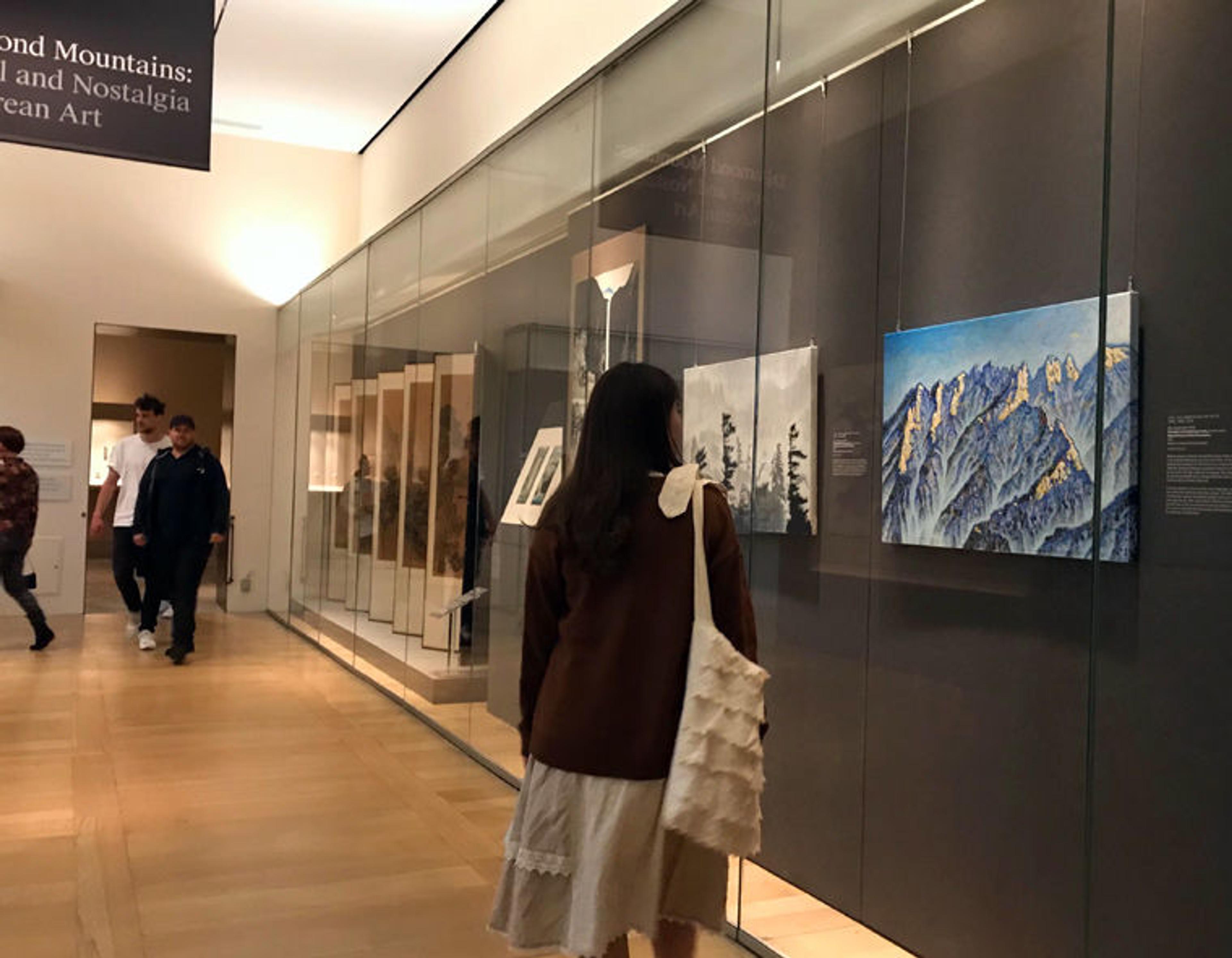 A woman reflects on two paintings of the Diamond Mountains in the Arts of Korea gallery