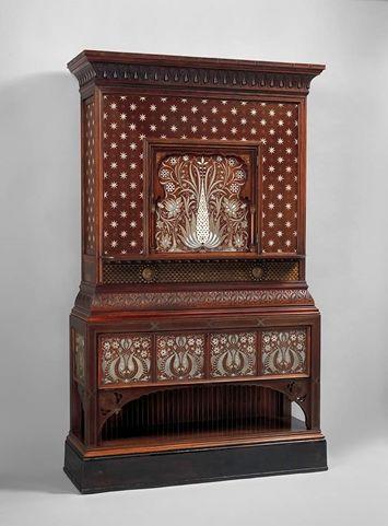 Tall wood cabinet with intricate inlay