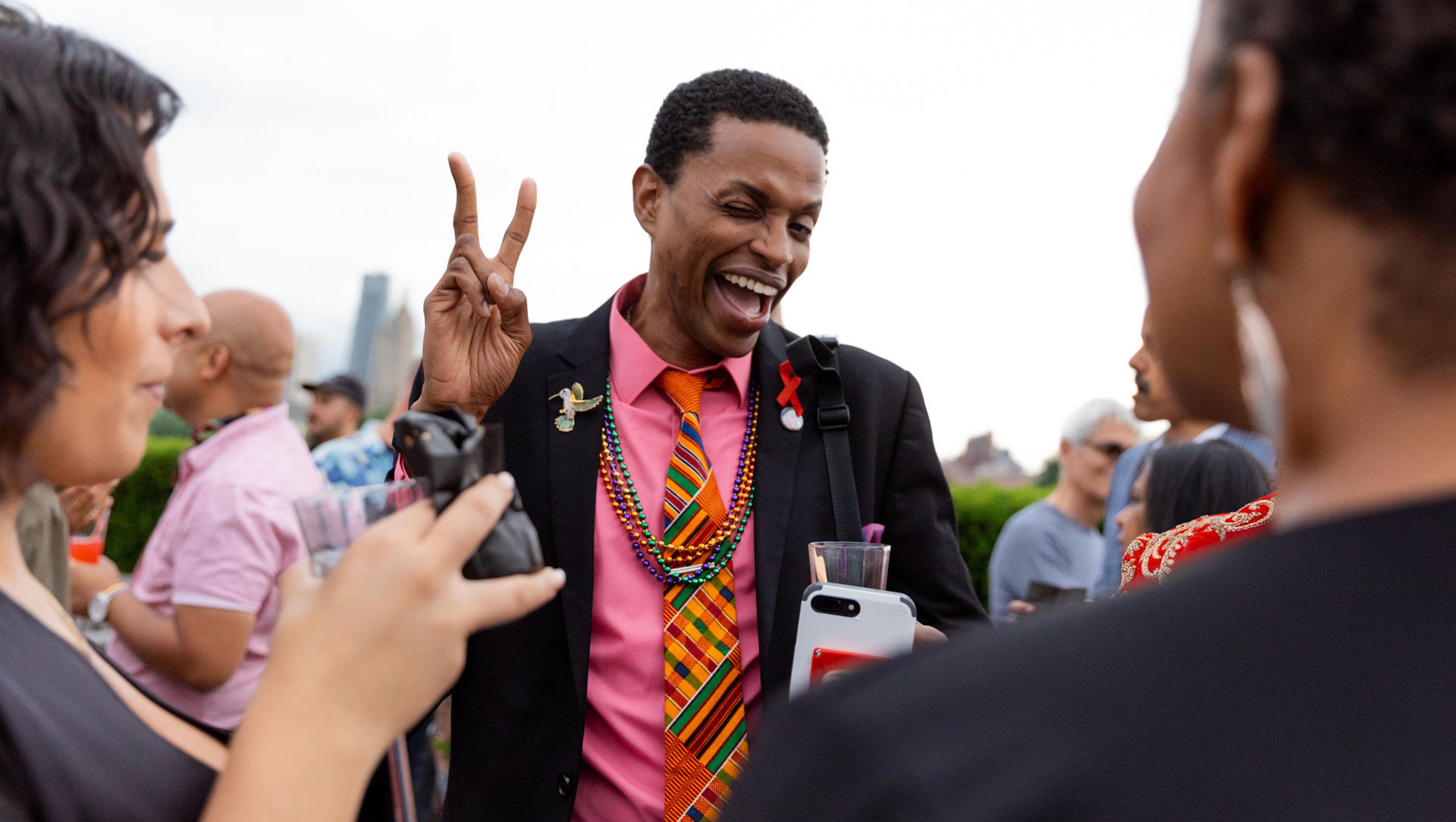A group of individuals on The Met's Cantor Roof Garden.