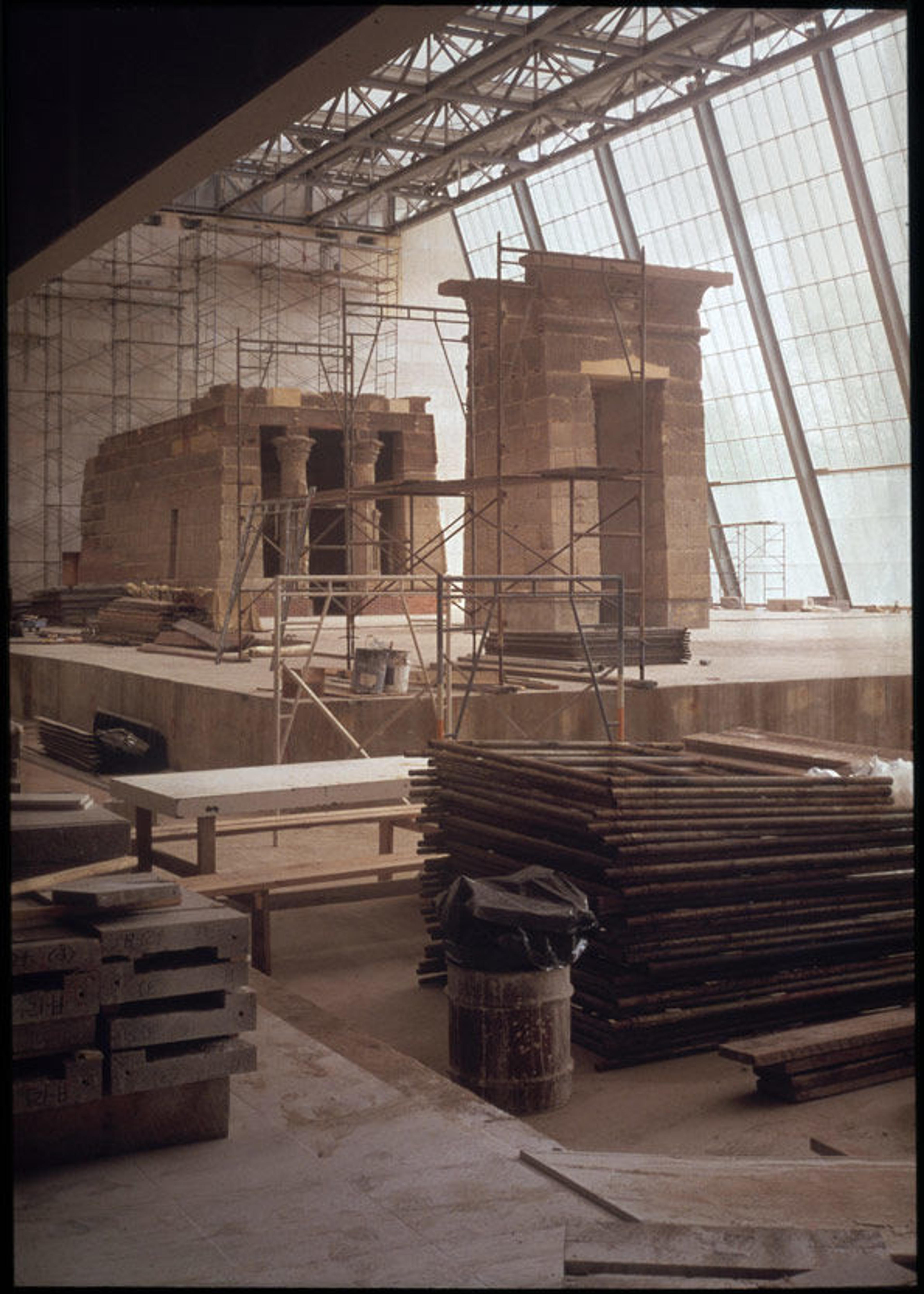 Construction of The Temple of Dendur, Fourth Phase, MMA Installation: general view, south and east sides, with materials and scaffolding in foreground