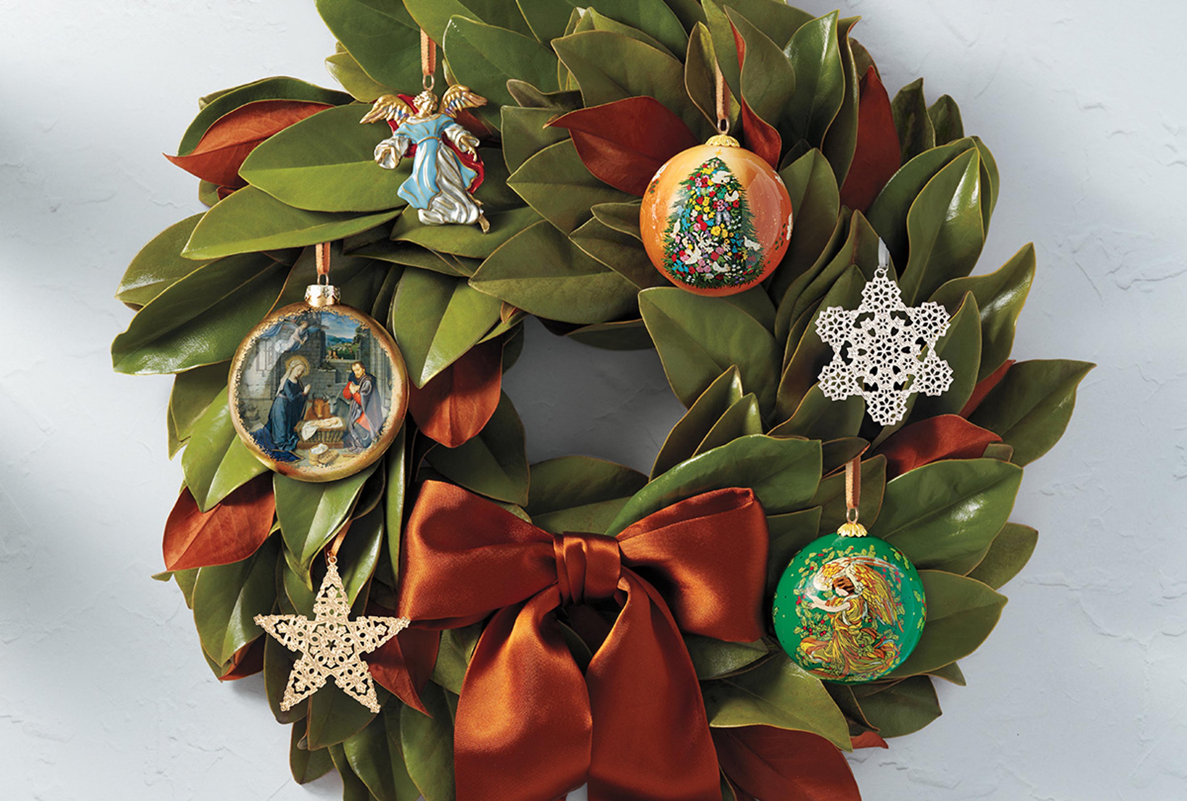A holiday garland decorated with Ornaments from The Met Store.