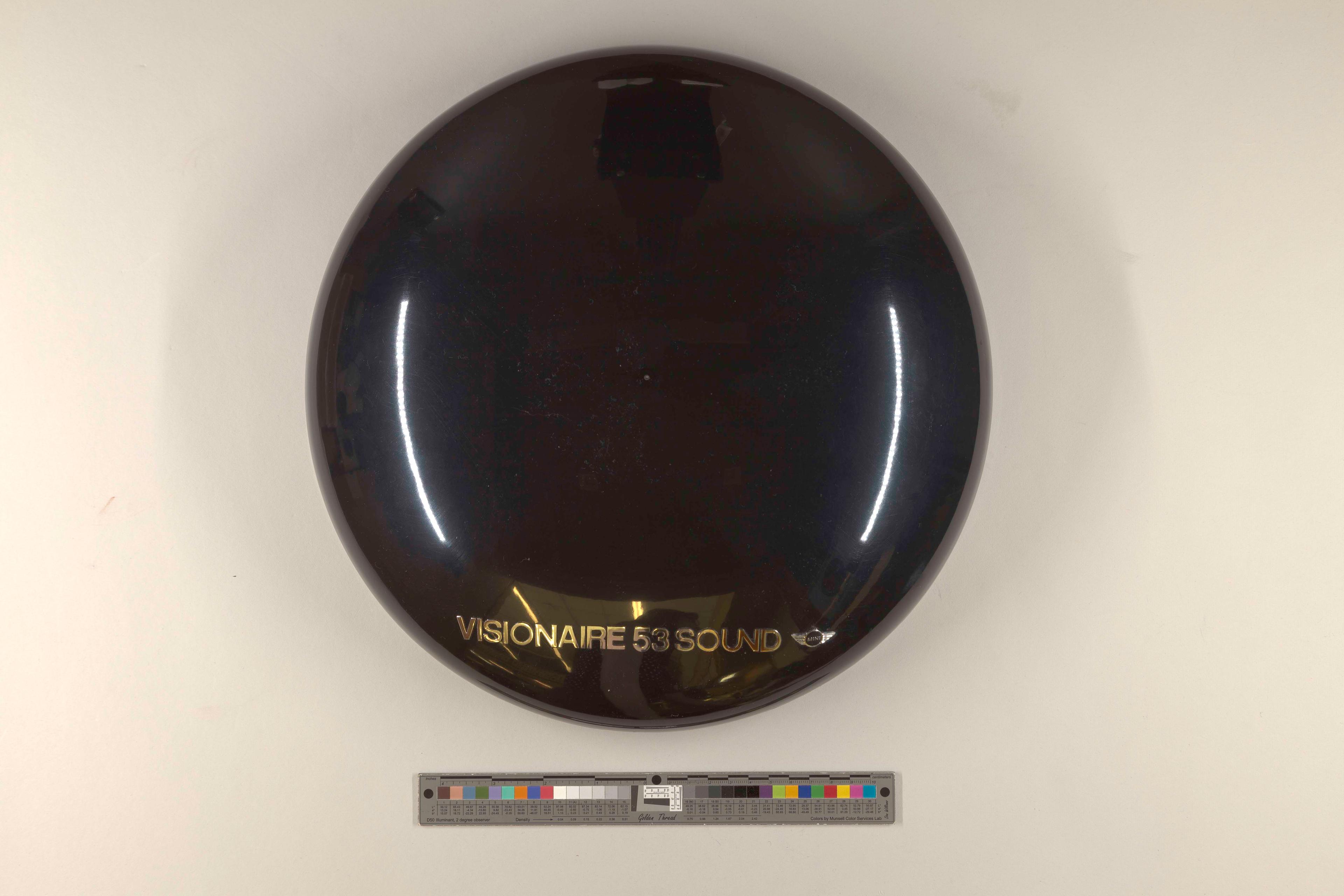 Domed black case containing the artist's book