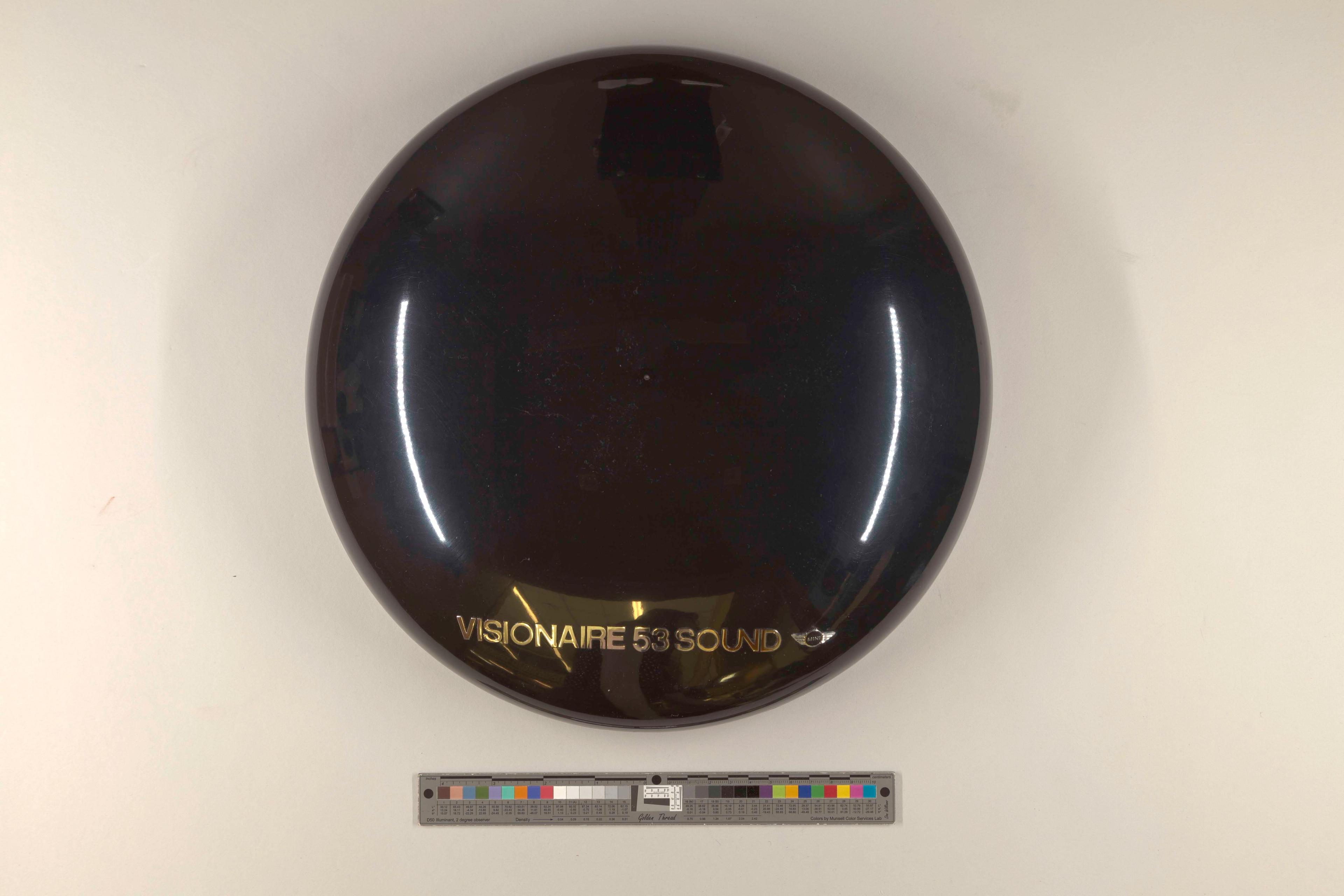 Domed black case containing the artist's book