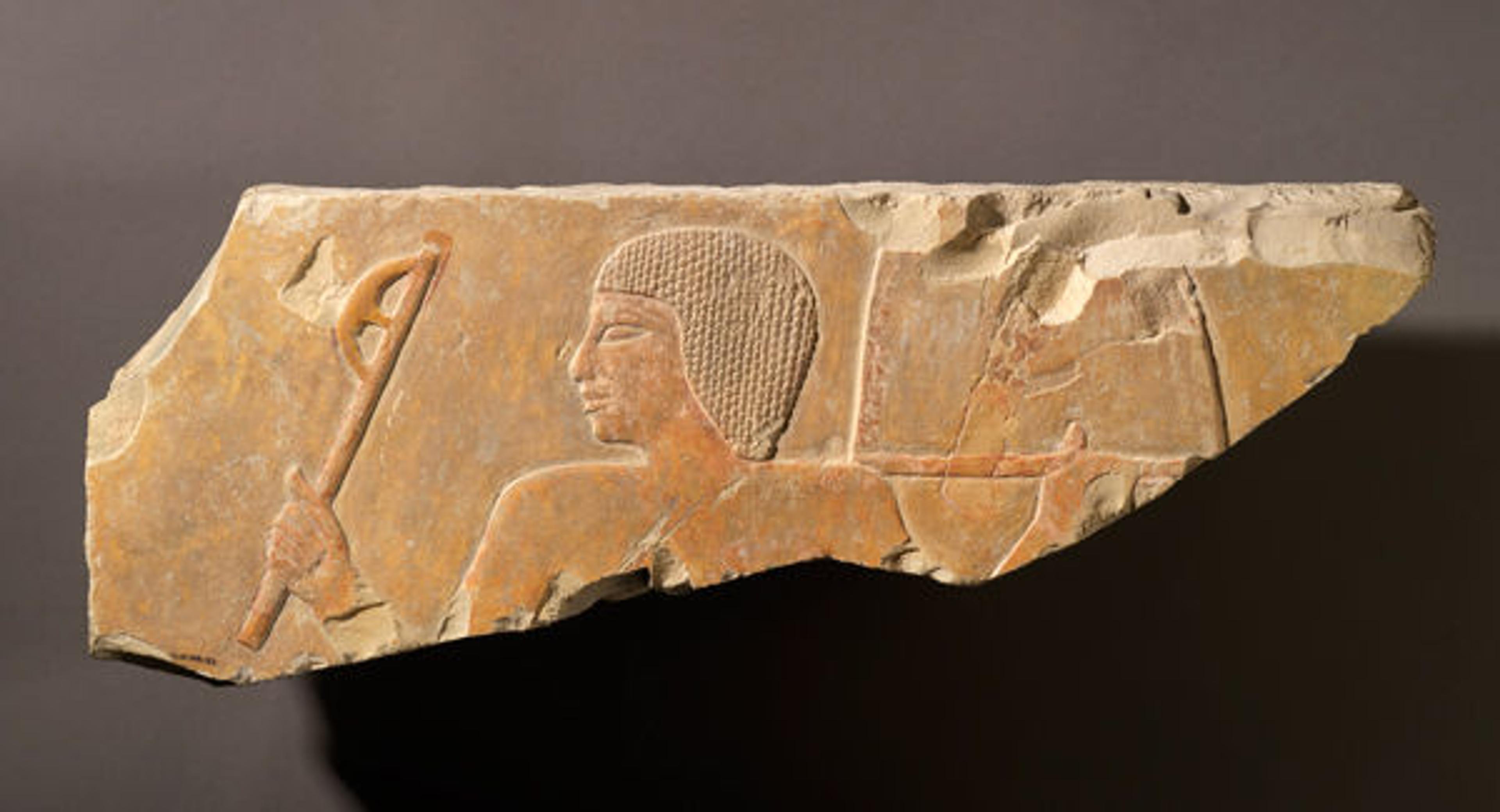 Fig. 2. Relief of a soldier with an ax. Middle Kingdom, Dynasty 11, reign of Nebhepetre Mentuhotep II (ca. 2030–2000 B.C.). Thebes, Deir el-Bahri, temple of Nebhepetre Mentuhotep II. Painted limestone; 6 1/2 x 18 7/16 in., 14.5 lb. (16.5 x 46.9 cm, 6.6 kg). Royal Ontario Museum, Toronto (910.34.53) Photo © Royal Ontario Museum