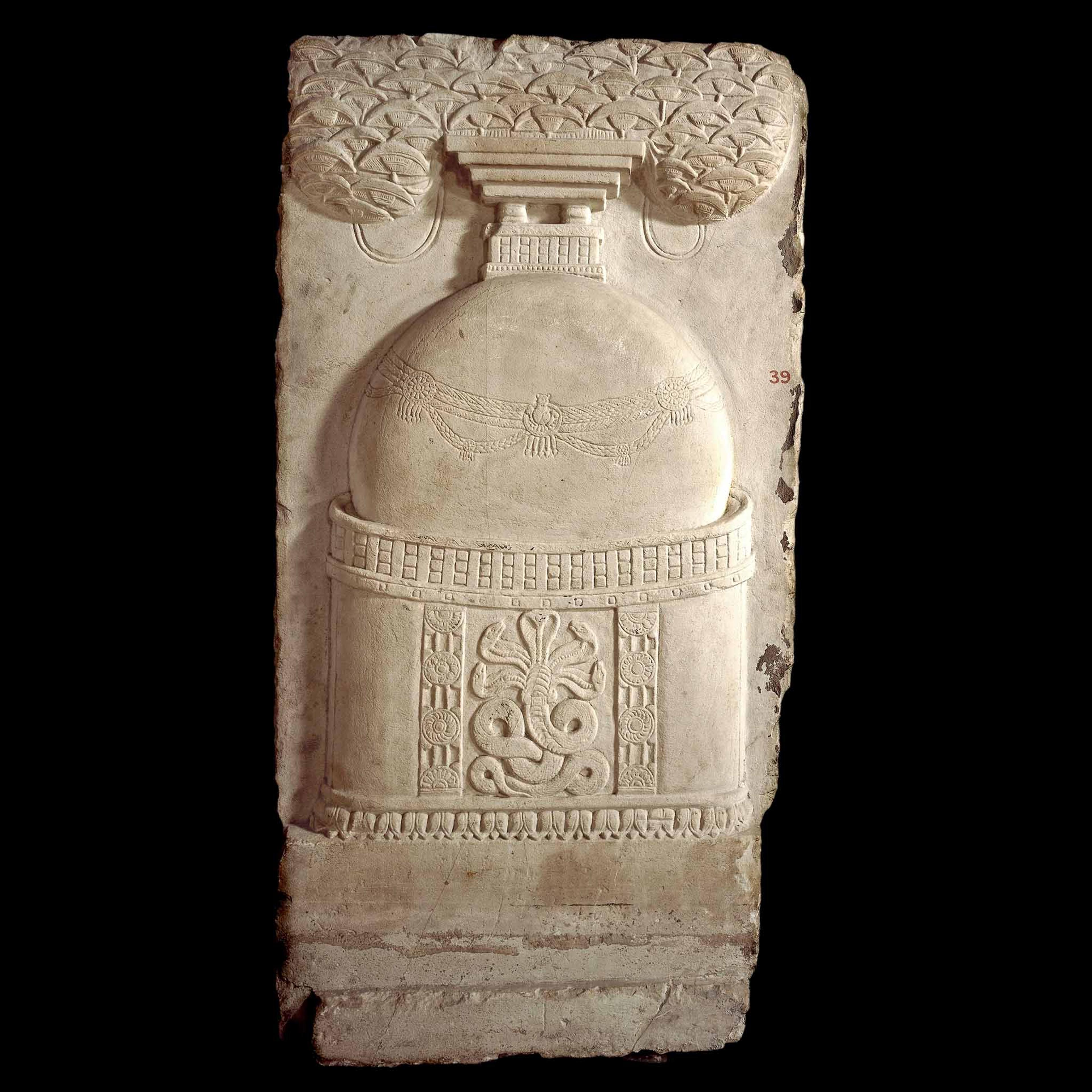 Stupa drum panel with protective serpent