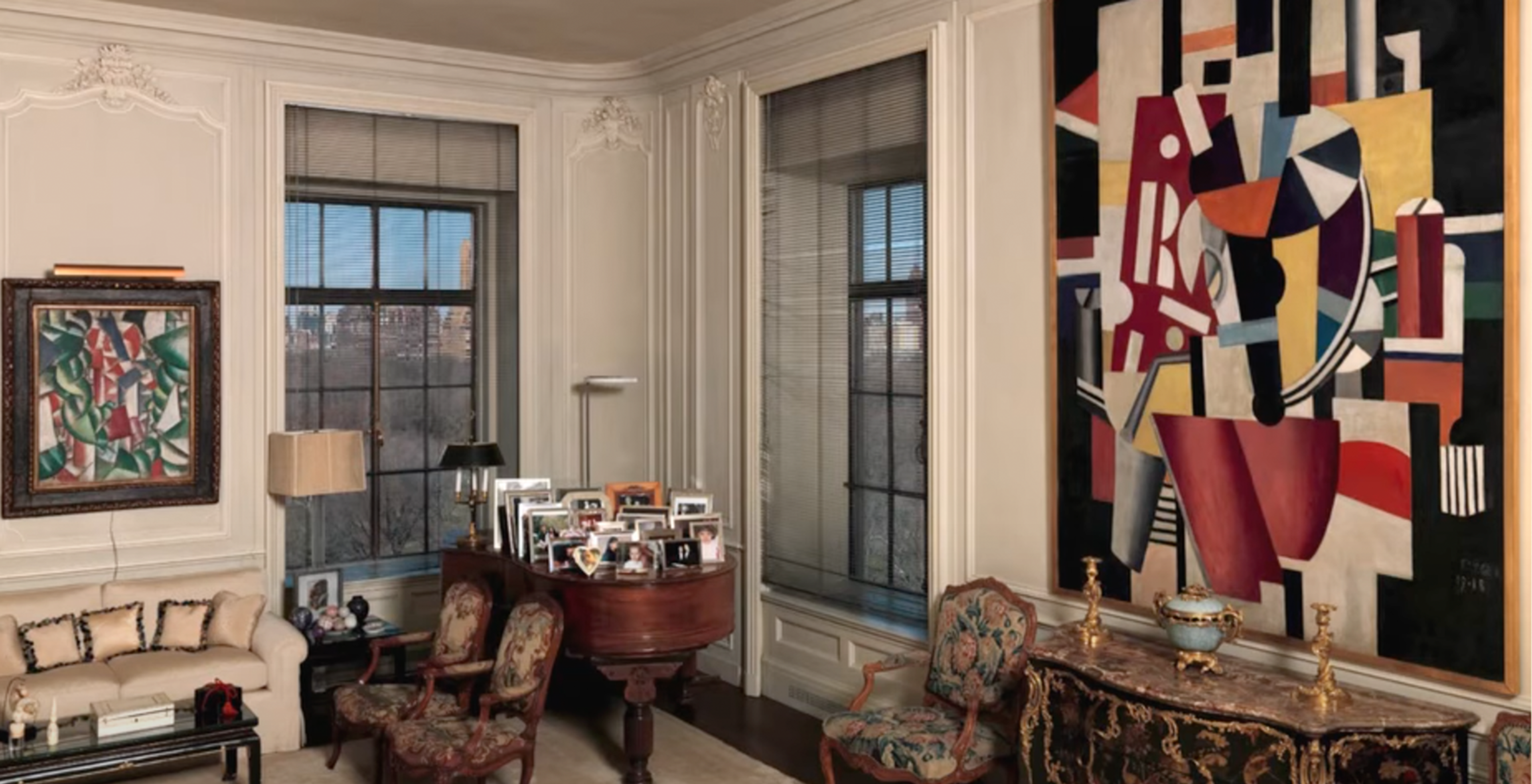 The living room of Leonard A. Lauder, featuring "Composition (The Typographer)" and "Houses under the Trees" both by Fernand Léger.