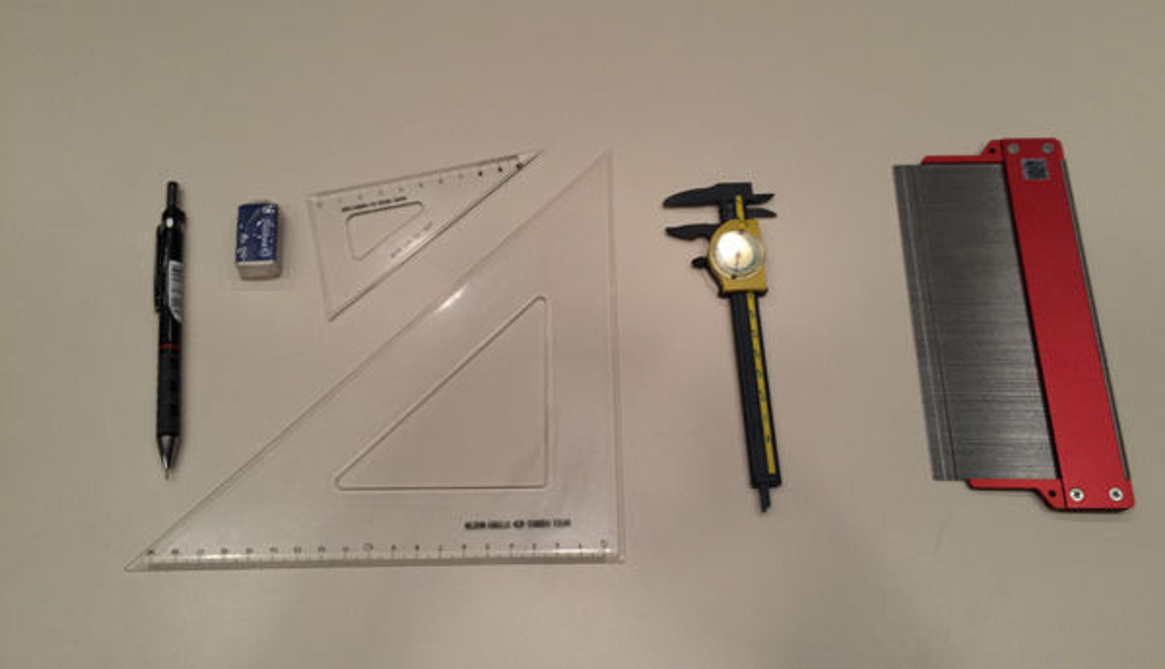 Tools of the trade (left to right): pencil, eraser, right triangles, caliper, profile gauge 