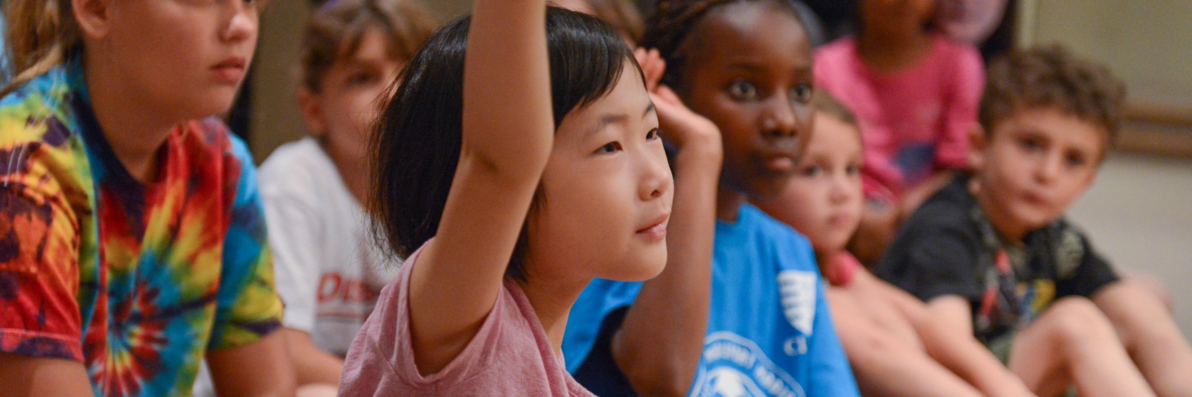 Young students taking part in a discussion during a school visit at The Met