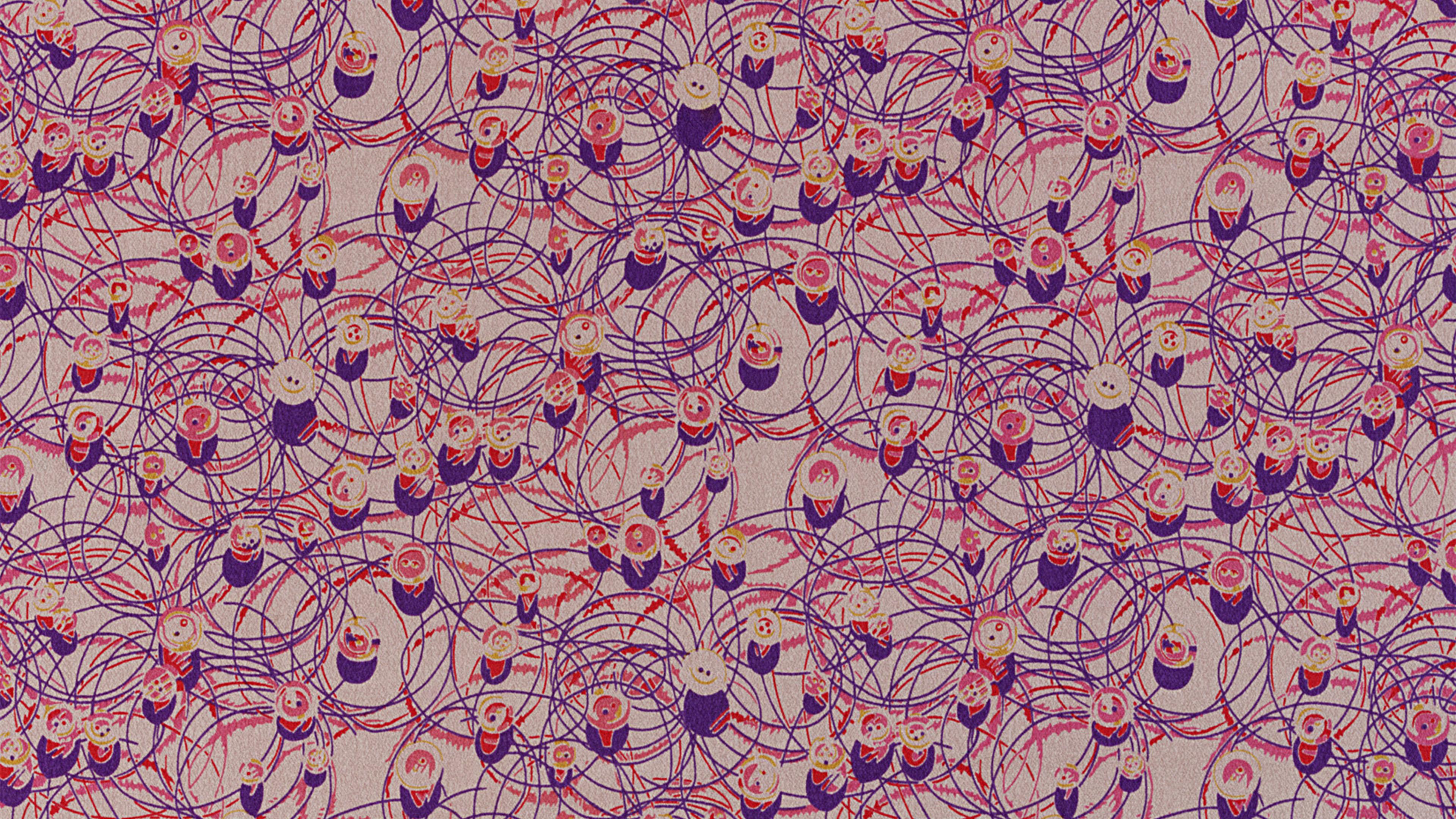 Pink fabric with small to large red and purple thin circle lines. 