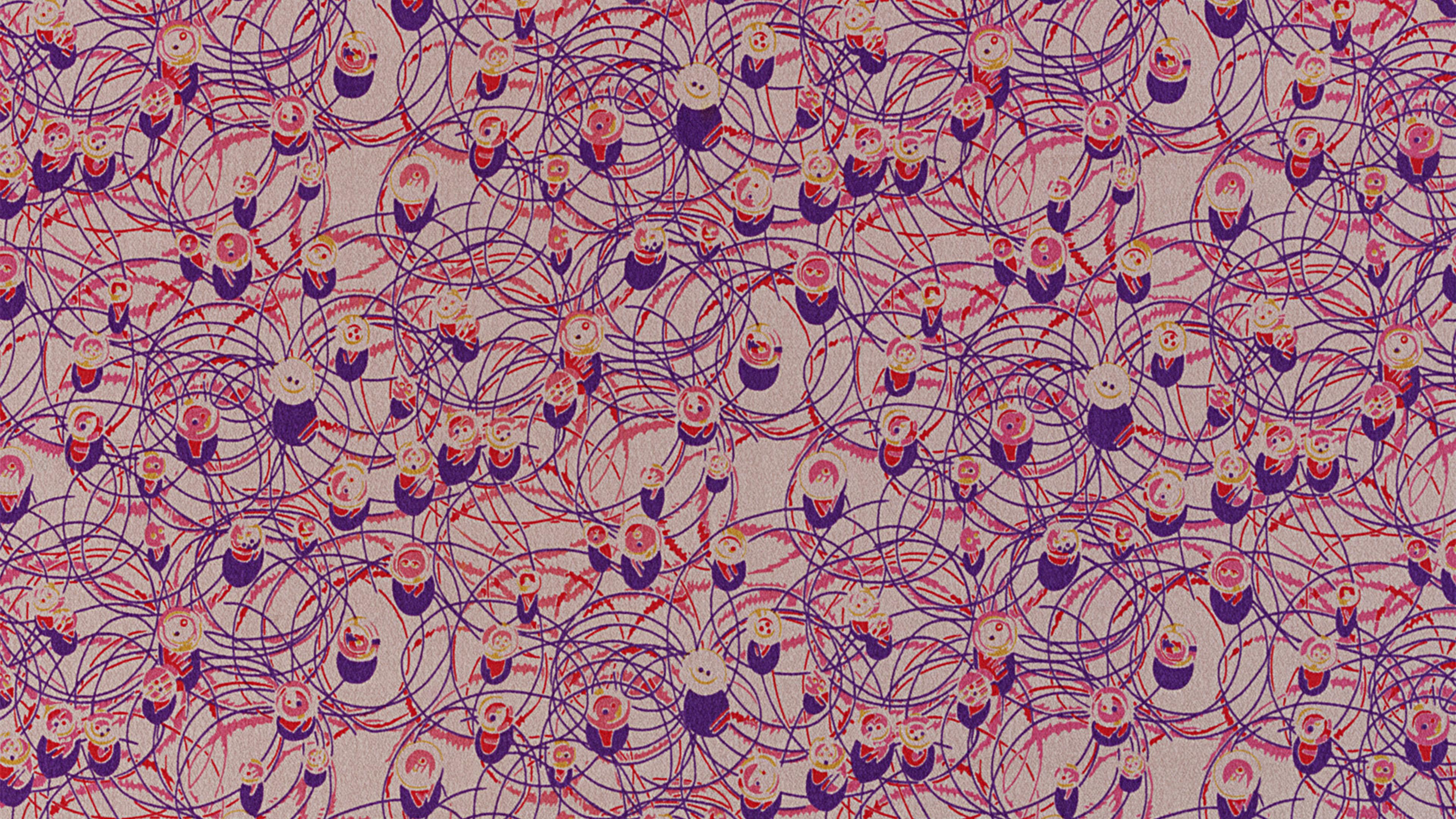 Pink fabric with small to large red and purple thin circle lines.