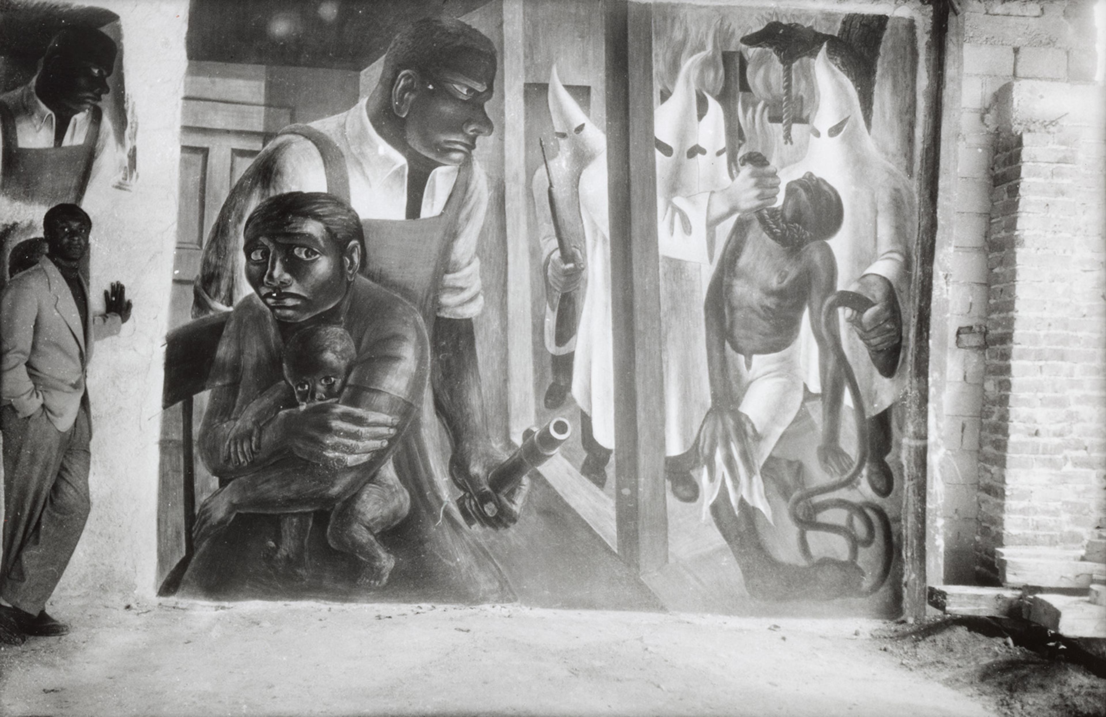 Black and white mural depicting oppression, with a man holding a child, anguished faces, and figures in hoods and robes.
