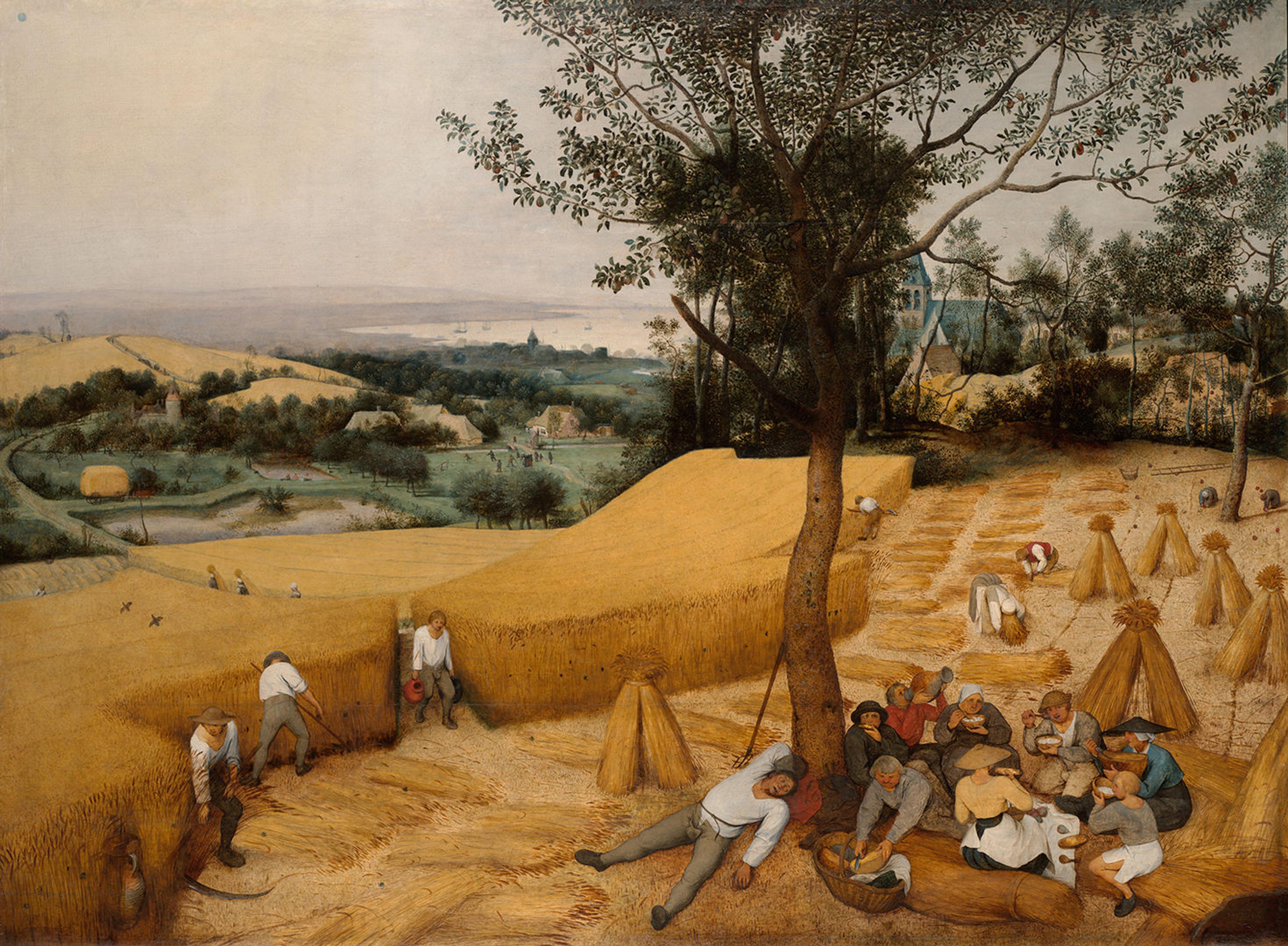 A scene of country life. In the foreground, laborers harvest from yellowed fields, while additional figures eat and rest under the shade of a tree. A greener space dotted with structures, and a water body with distant ships, are visible in the distance.