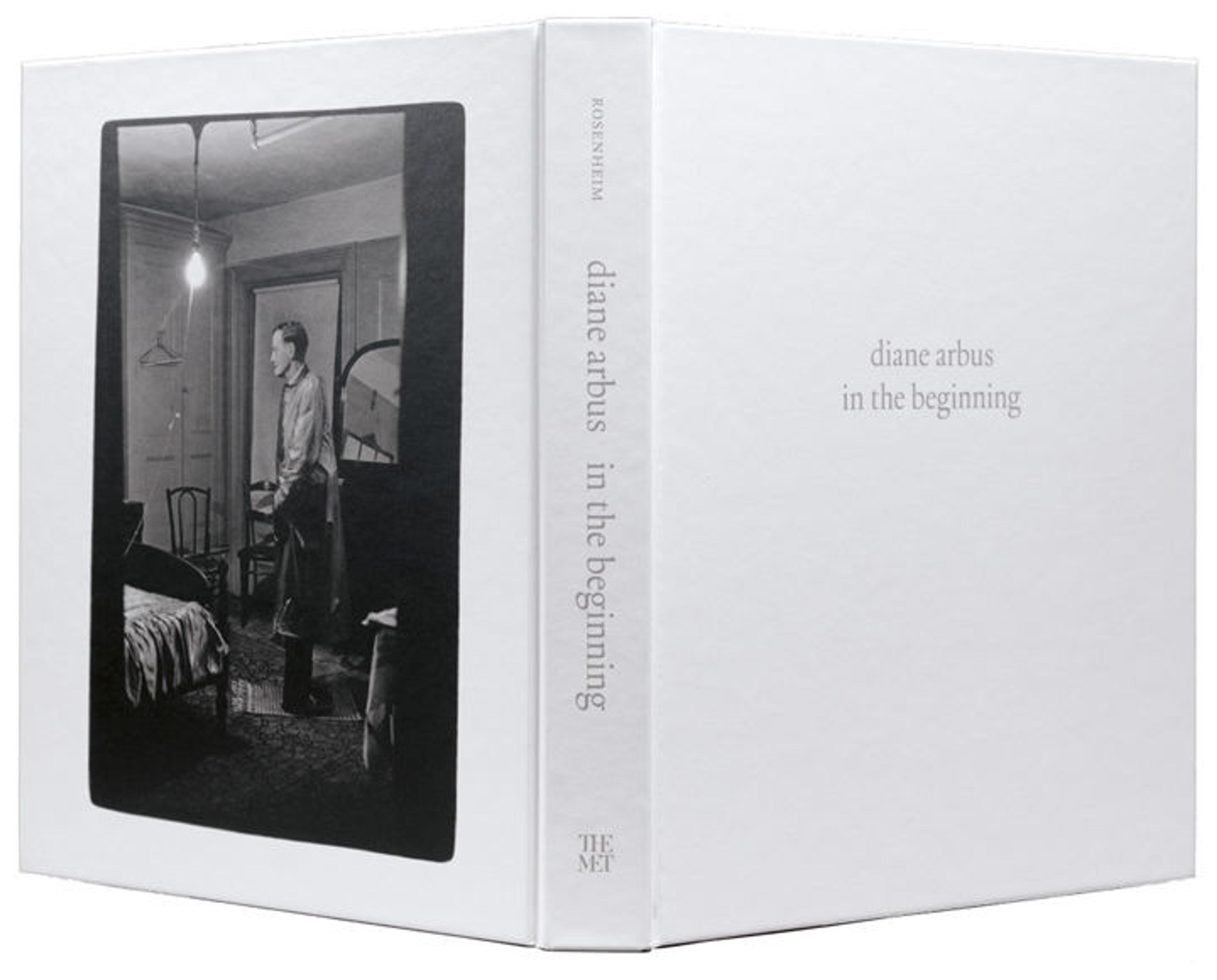 View of the front and back cover of the "diane arbus: in the beginning" exhibition catalogue