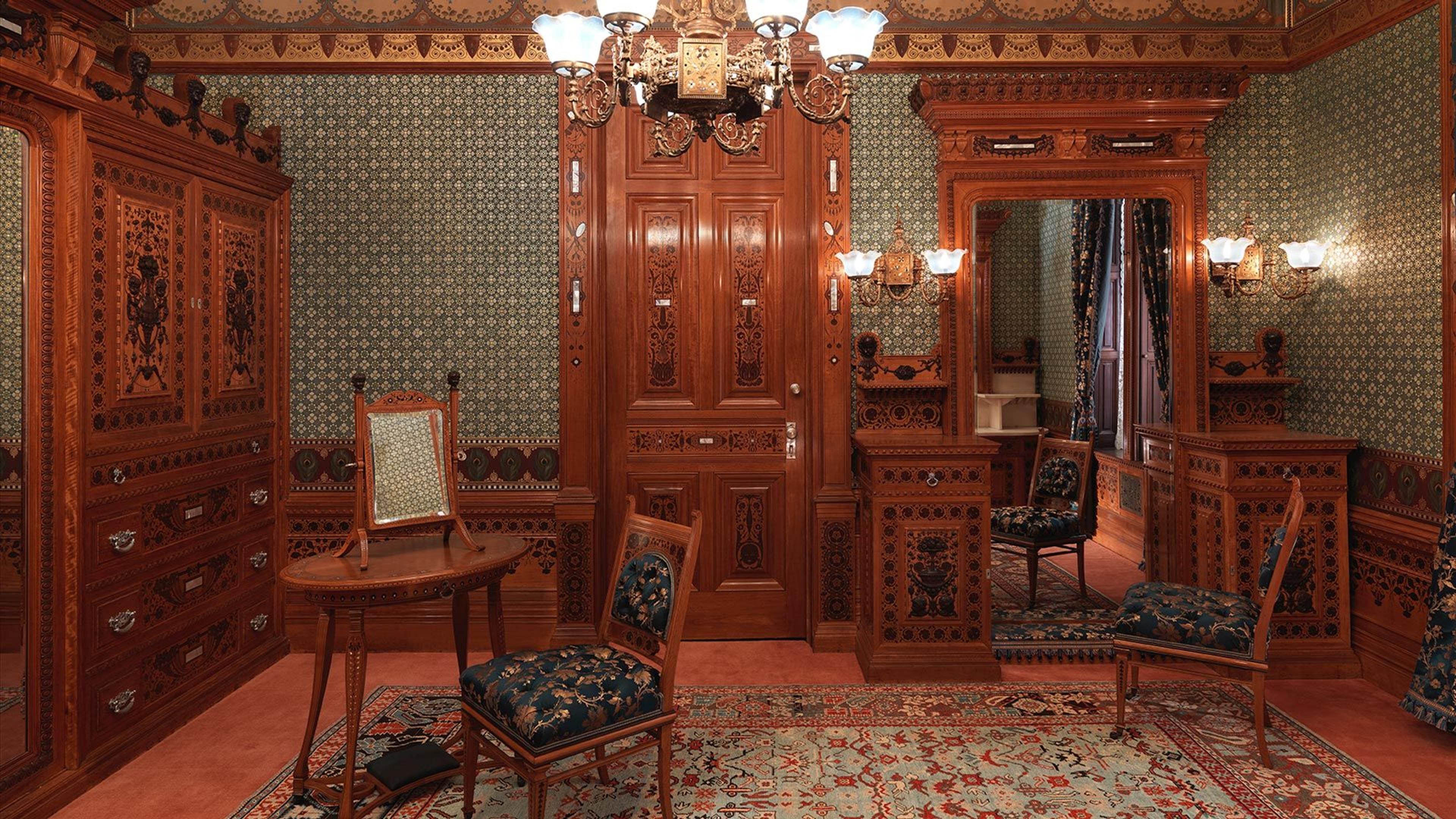 An elegant dressing room with wooden furniture