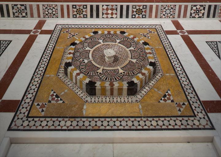 Detail view of mosaic tile on the floor of the Damascus Room