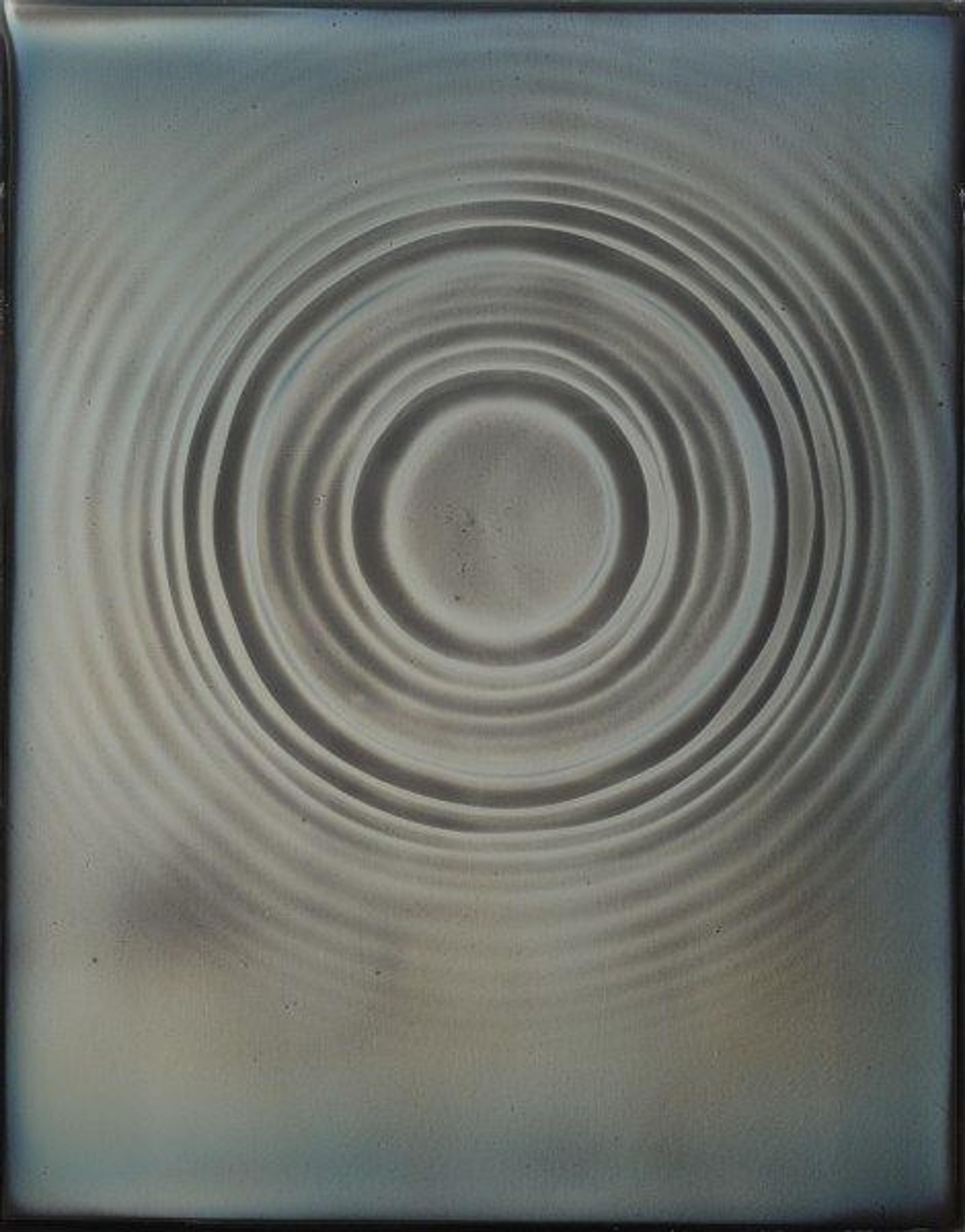 A photogram of concentric waves formed by a droplet of water spreading across the liquid surface of the metal daguerreotype plate.