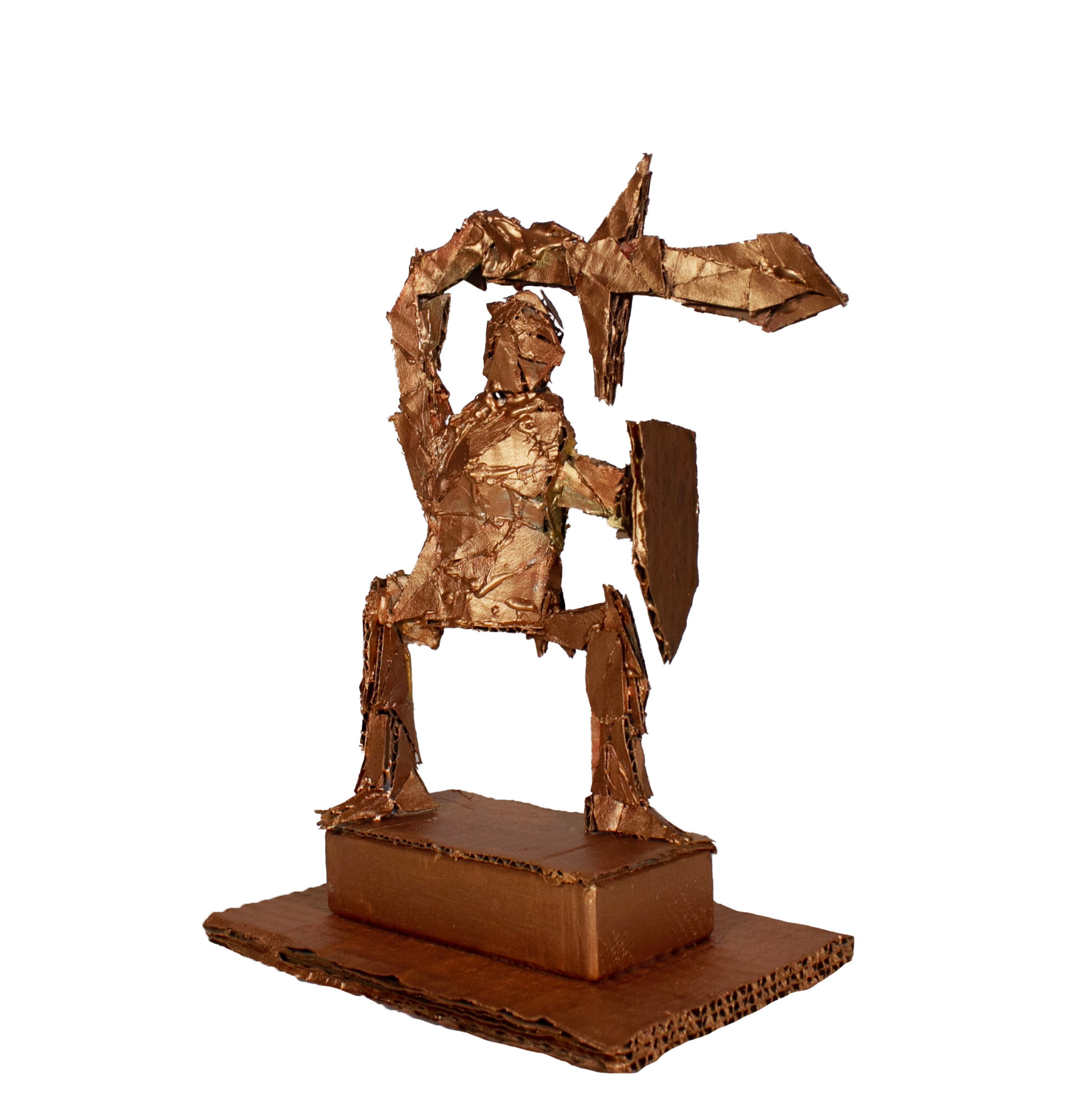 Cardboard-and–metallic paint sculpture of Orion facing right, represented as a copper-colored abstract figure, standing on a platform, holding a shield in front of him in his left hand and a sword pointed forward over his head in his right hand. 