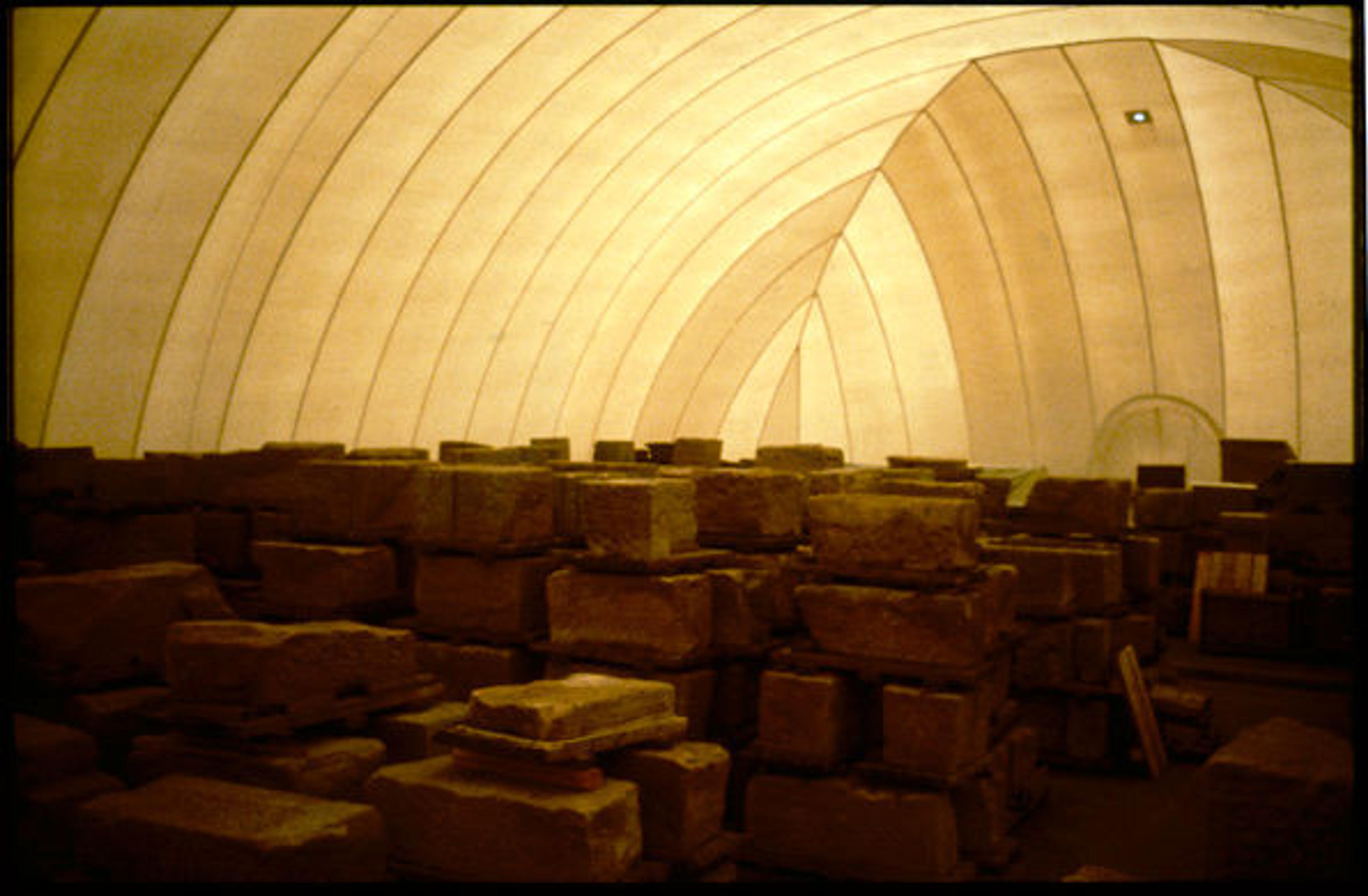 The sandstone blocks of The Temple of Dendur, before reassembly, in a plastic "bubble" on the Museum's South Parking Lot