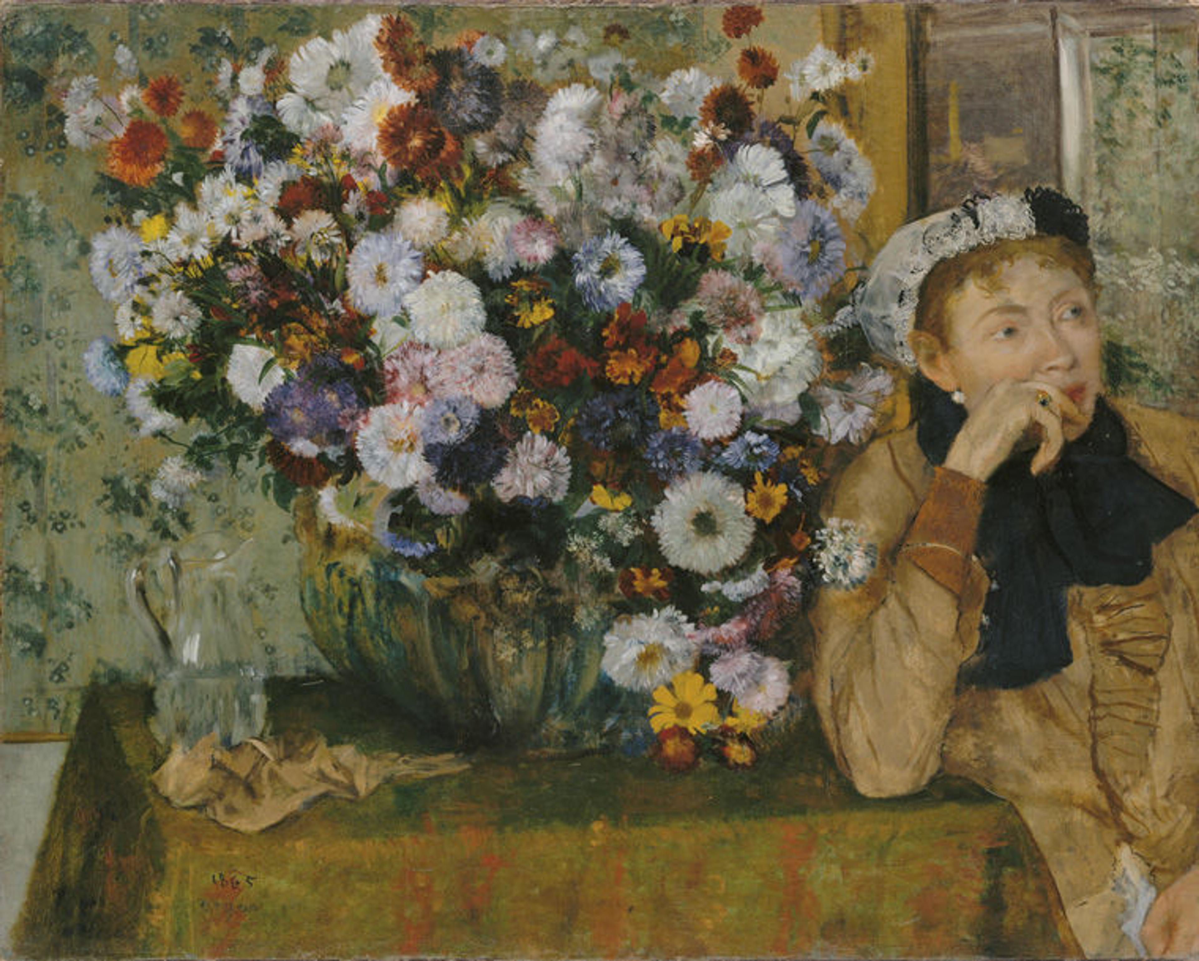Oil painting by Edgar Degas showing a woman in a heavy coat and headpiece seated beside a vase of flowers in full bloom