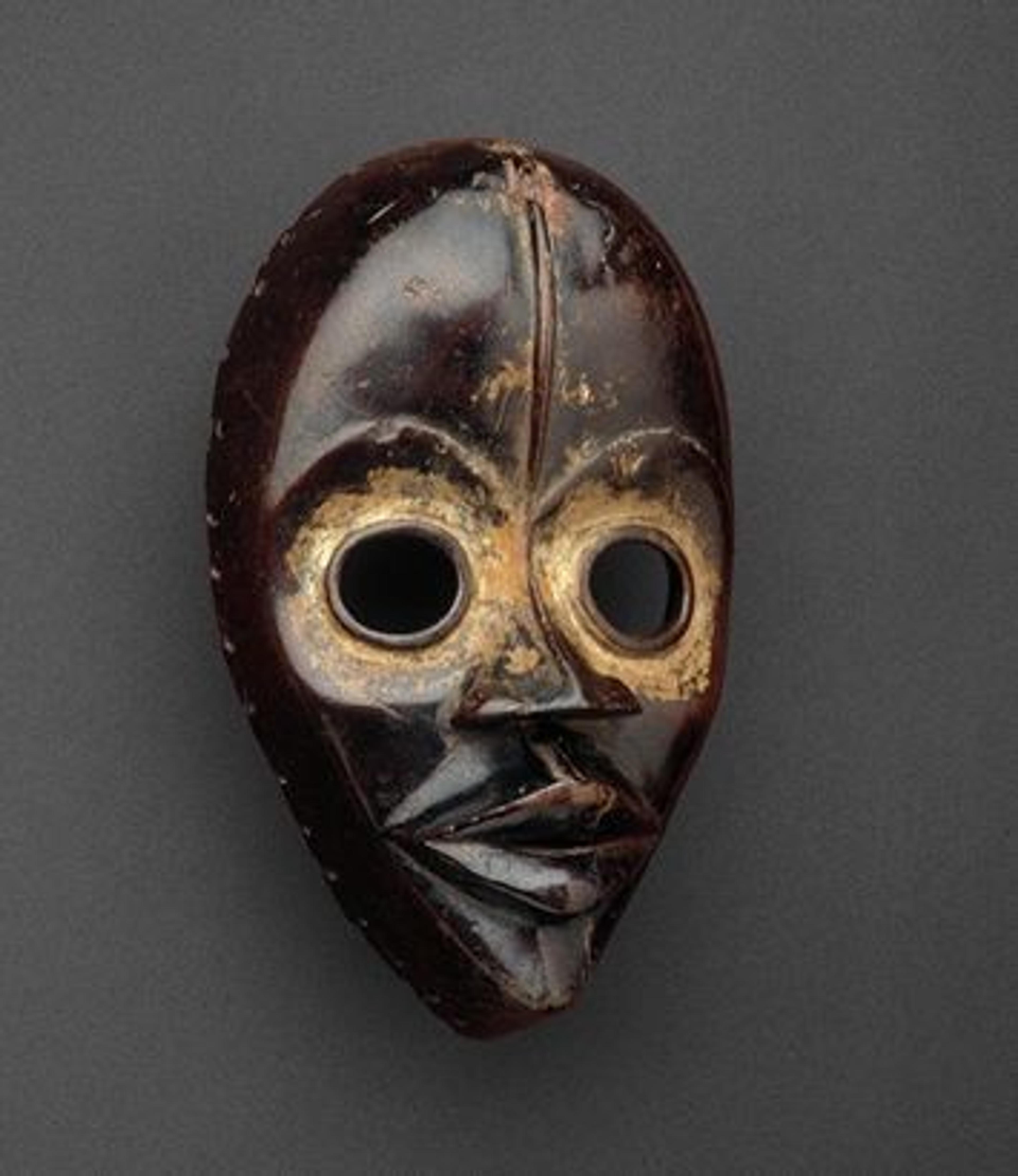 Mask made out of dark wood