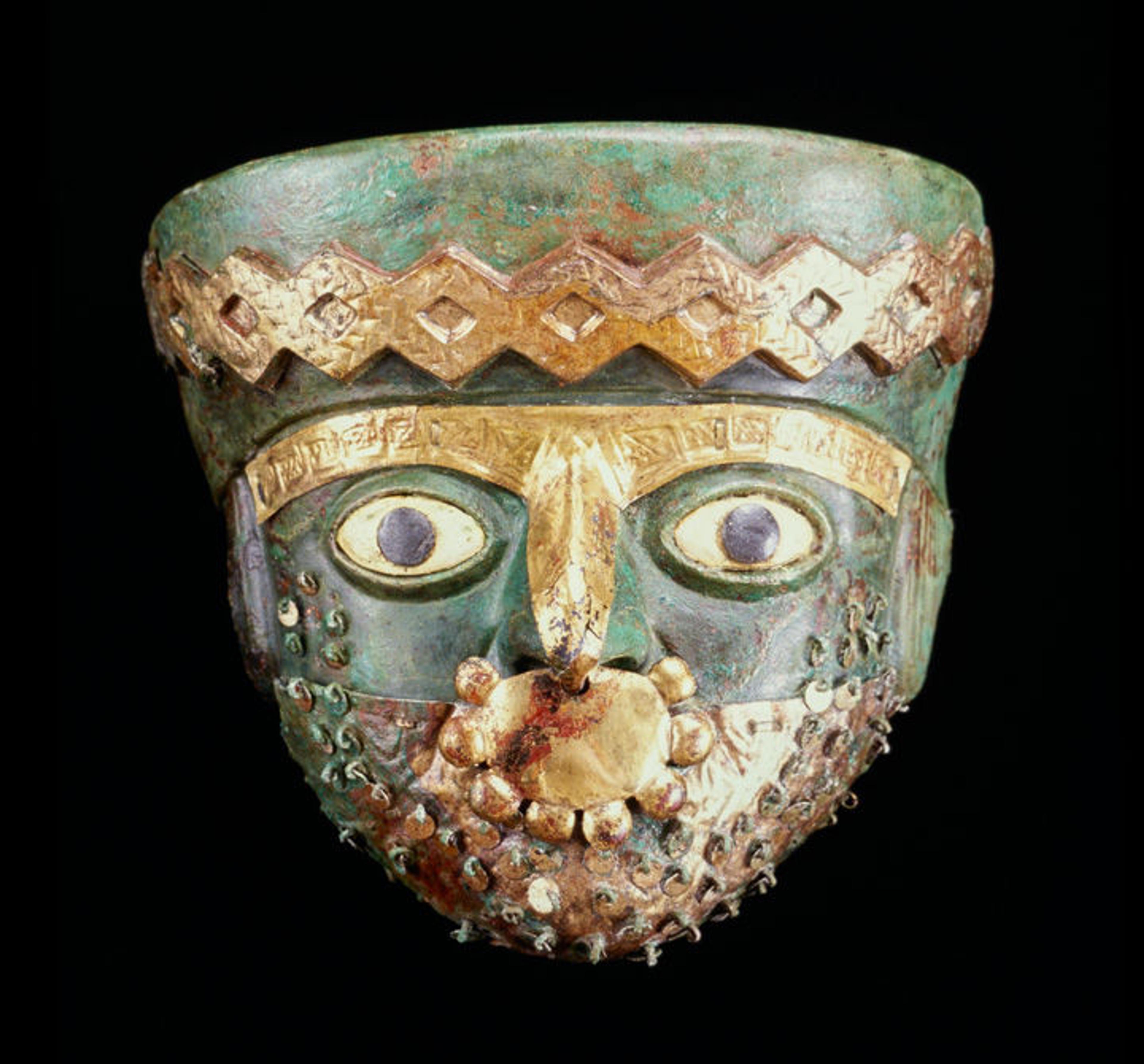 A Moche burial mask from ca. A.D. 550 made of copper, gilded copper, shell, and stone