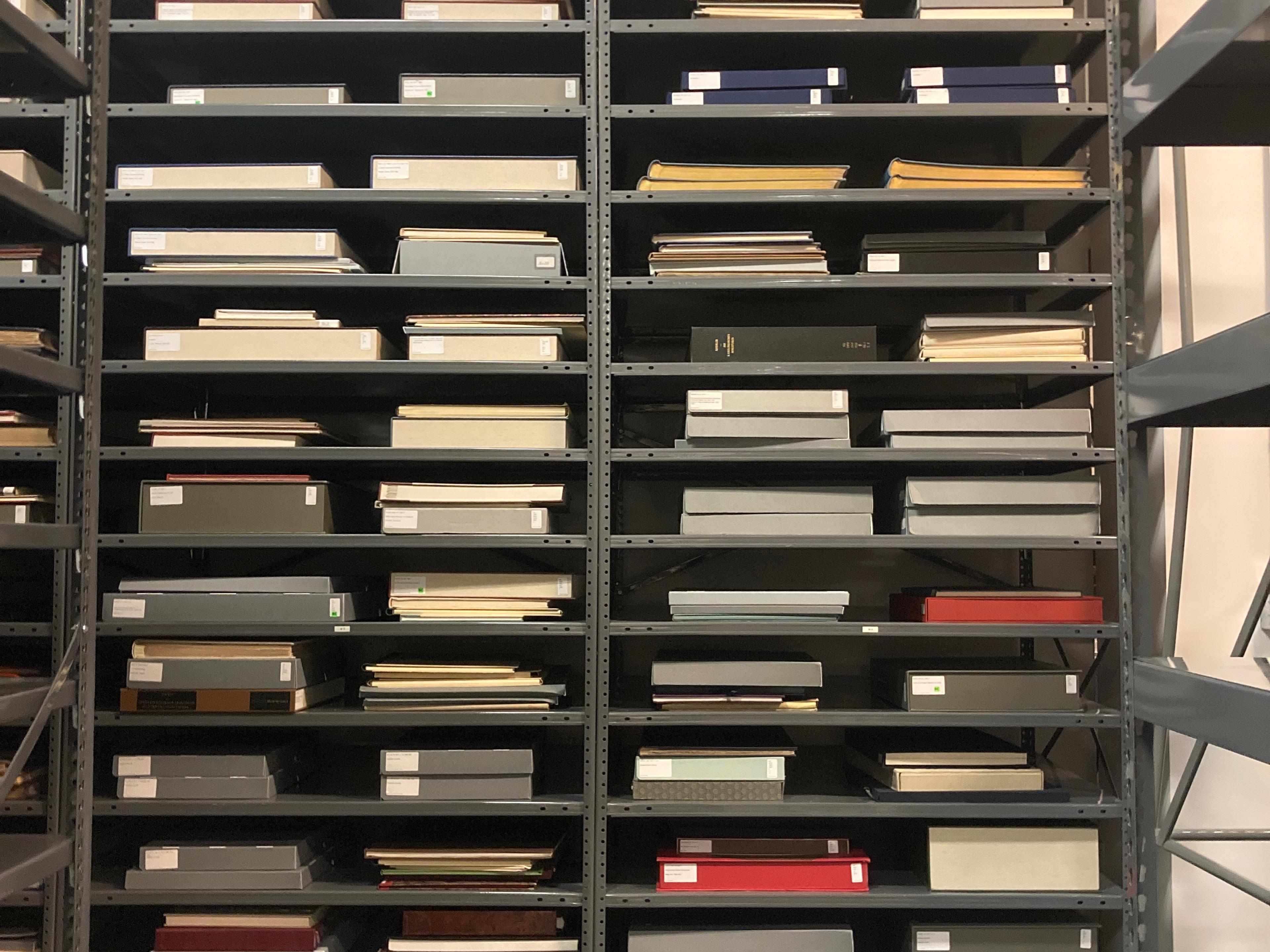 Folios sitting on new shelving units