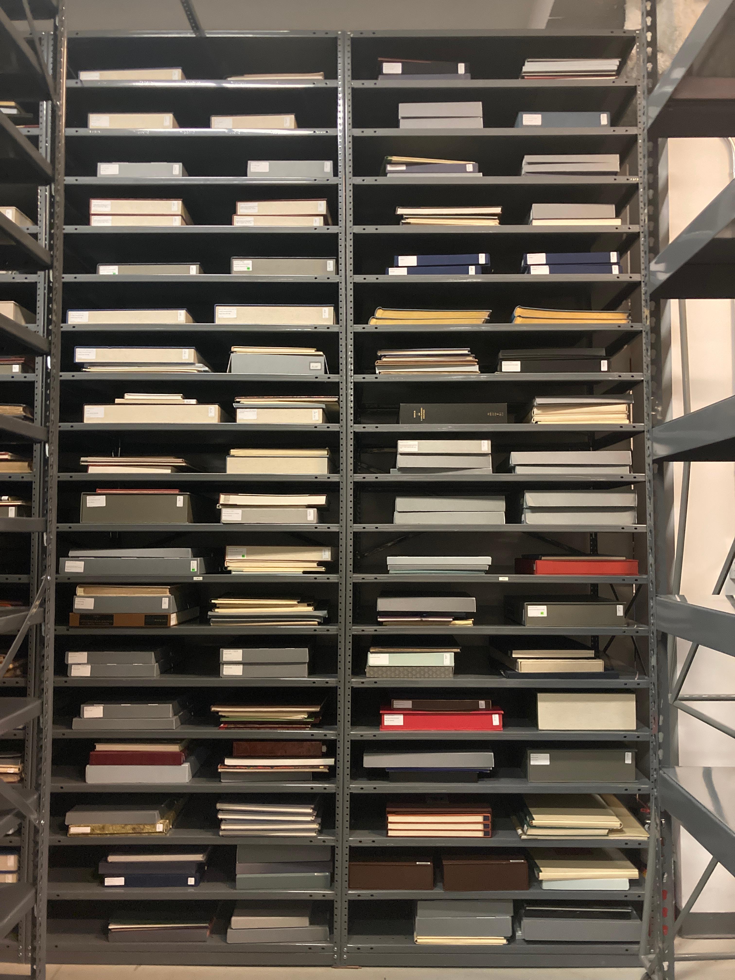 Folios sitting on new shelving units
