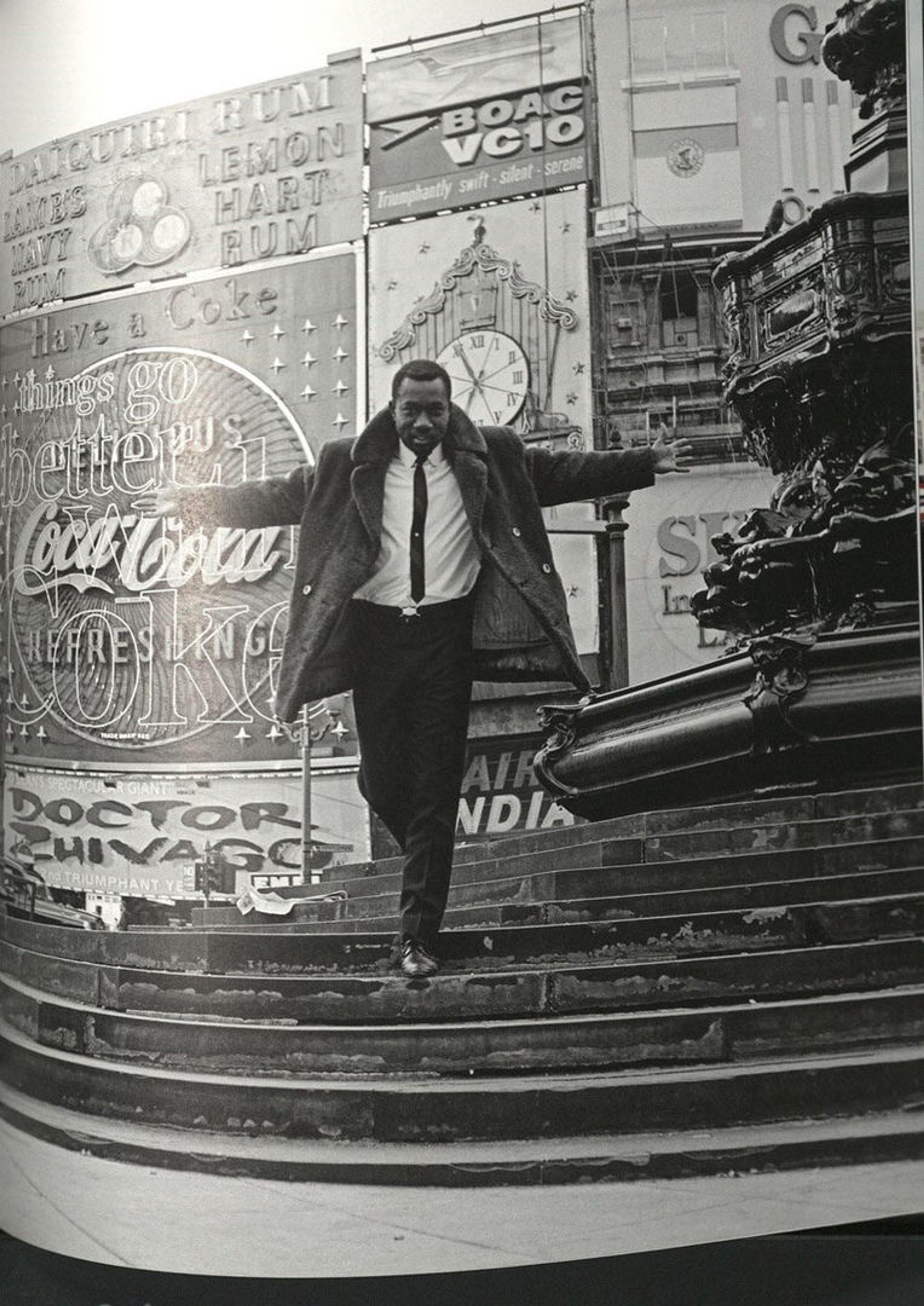 Man in a tie and jacket on staircase