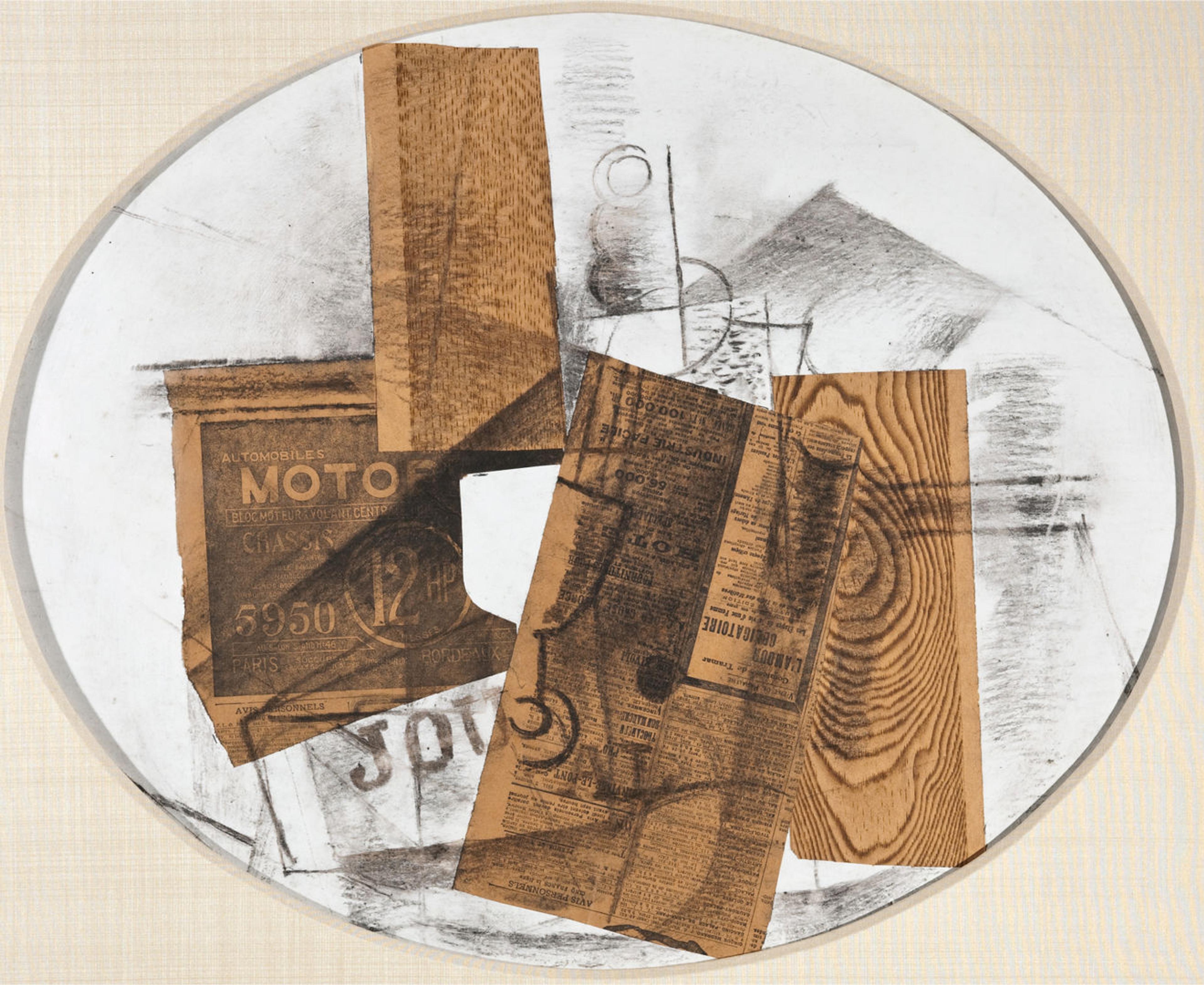 Circular white surface with overlayed orange printed papers