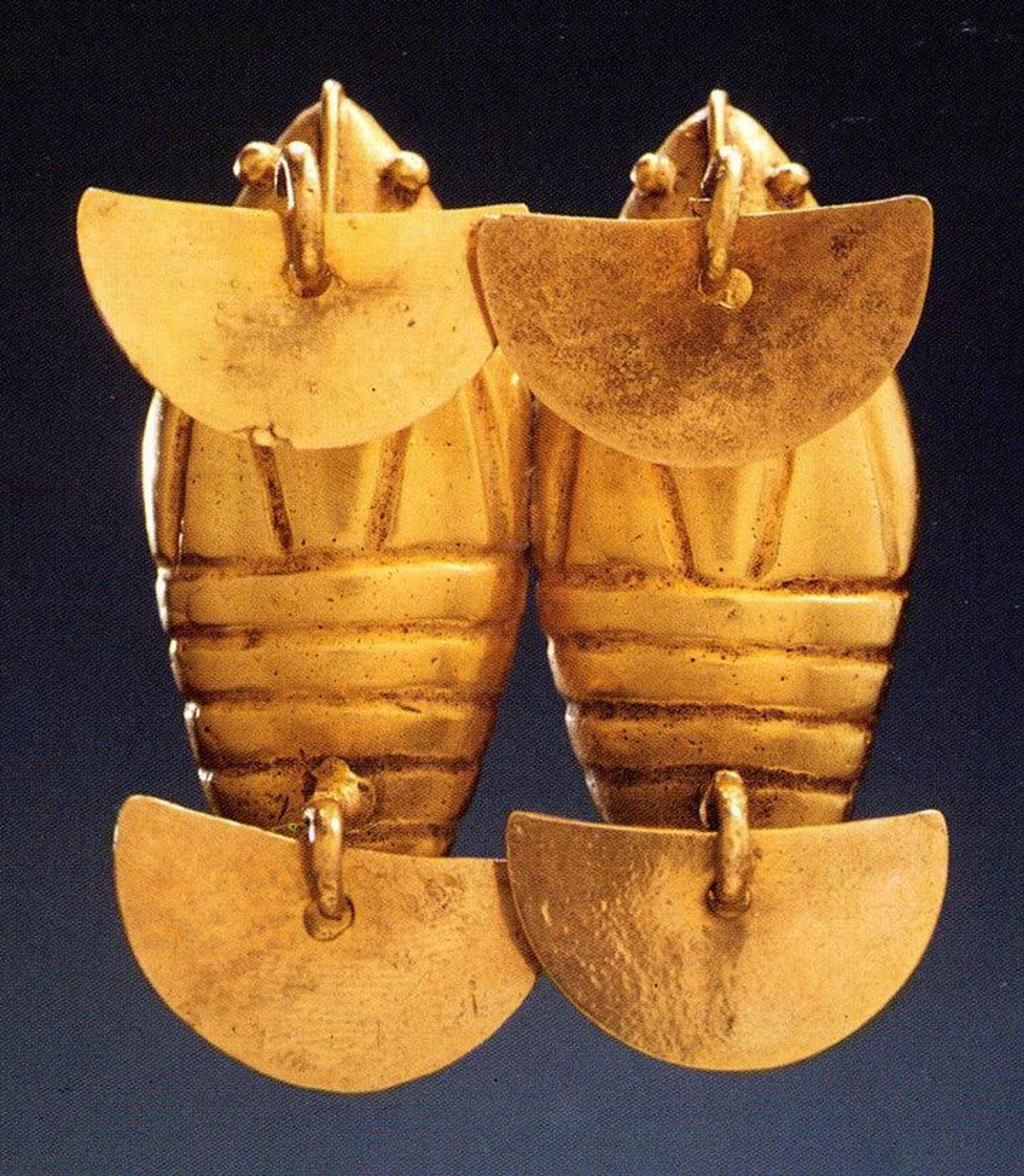 Double-insect pendant made in the Cauca River region of Colombia