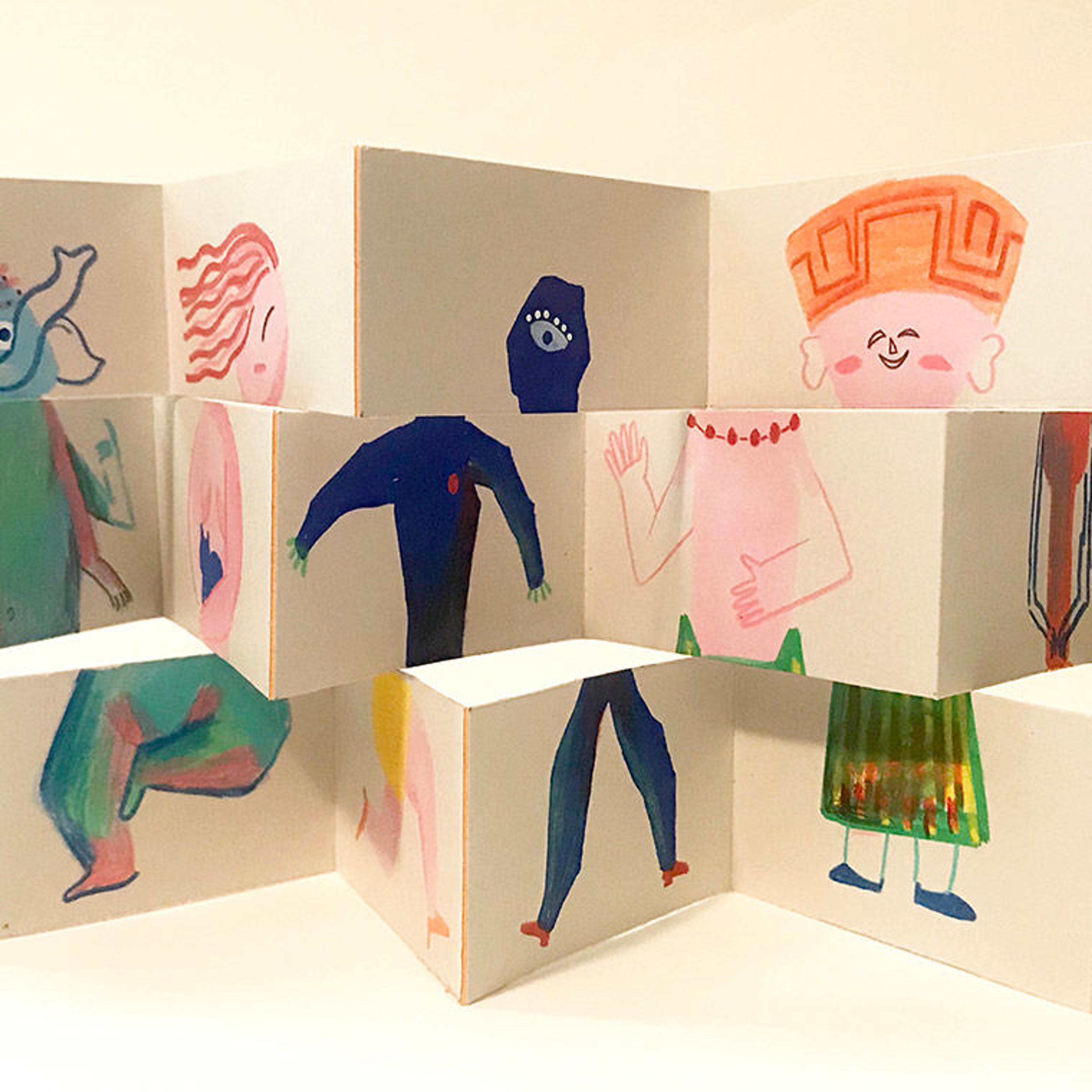 An unfolded accordion book featuring characters inspired by objects from the #MetKids Map