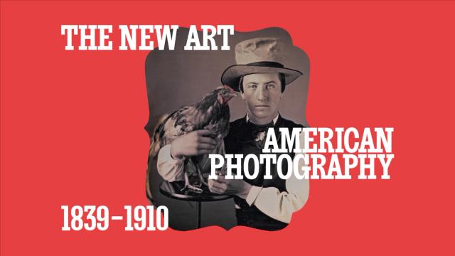 Man holding a living Rooster, again a red backdrop