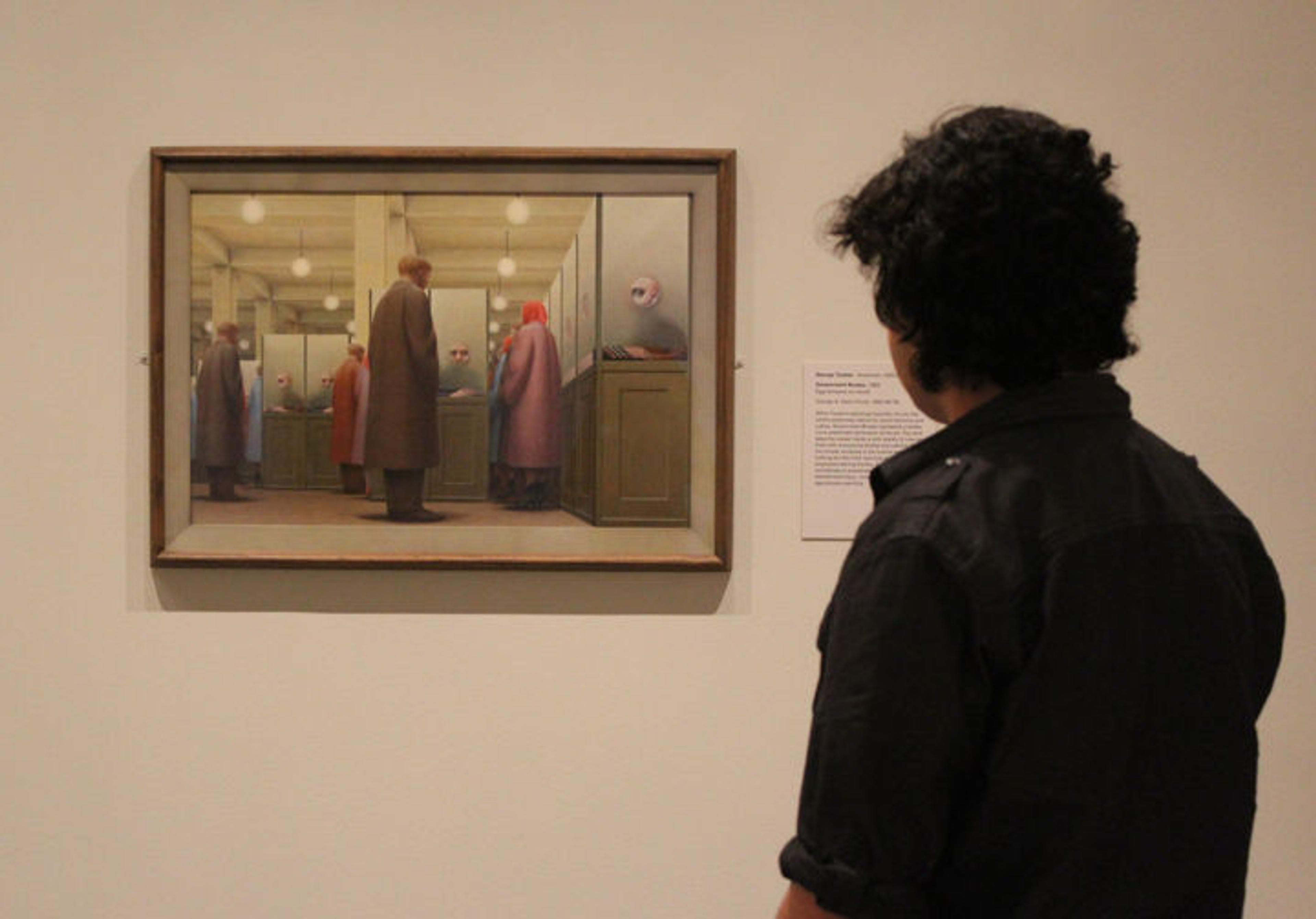 High School Intern Jason viewing George Tooker's Government Bureau.