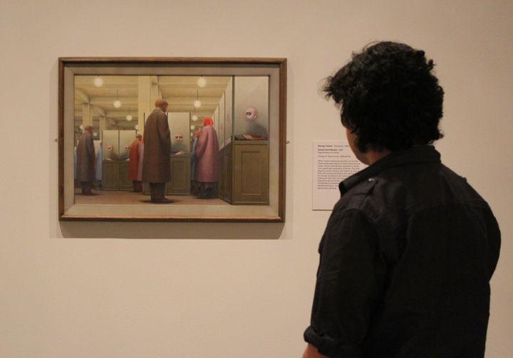High School Intern Jason viewing George Tooker's Government Bureau.