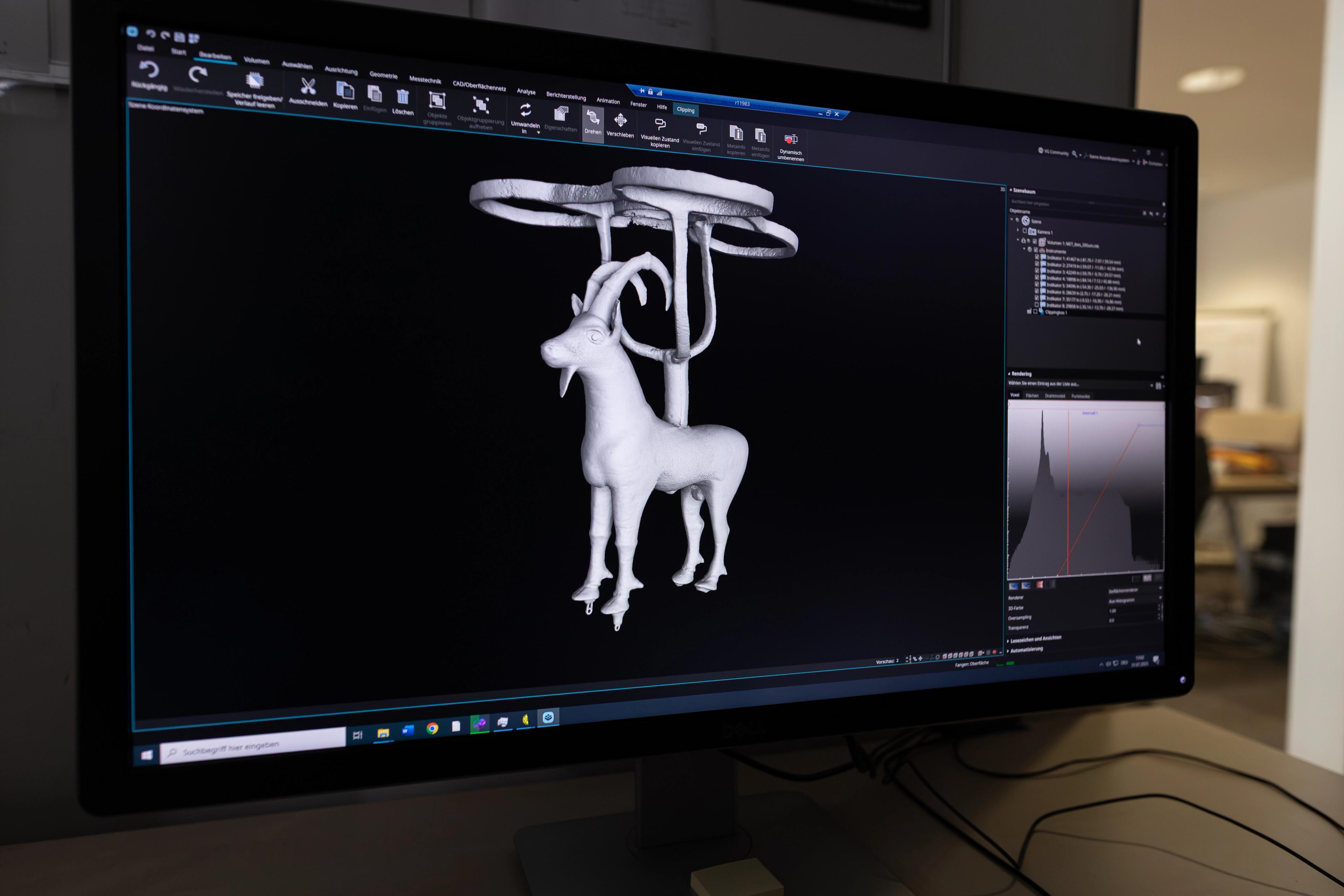 a computer screen showing a 3d scan of an ibex sculpture