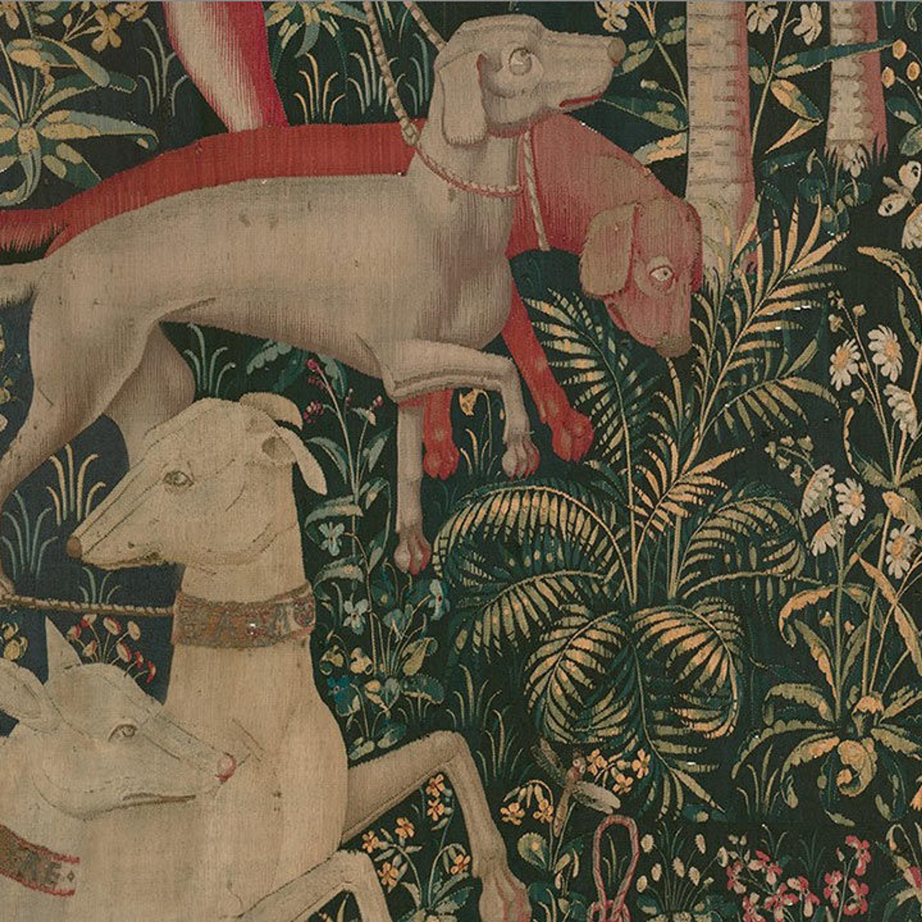 Detail of a date palm and dogs from "The Hunters Enter the Woods" from the Unicorn Tapestries